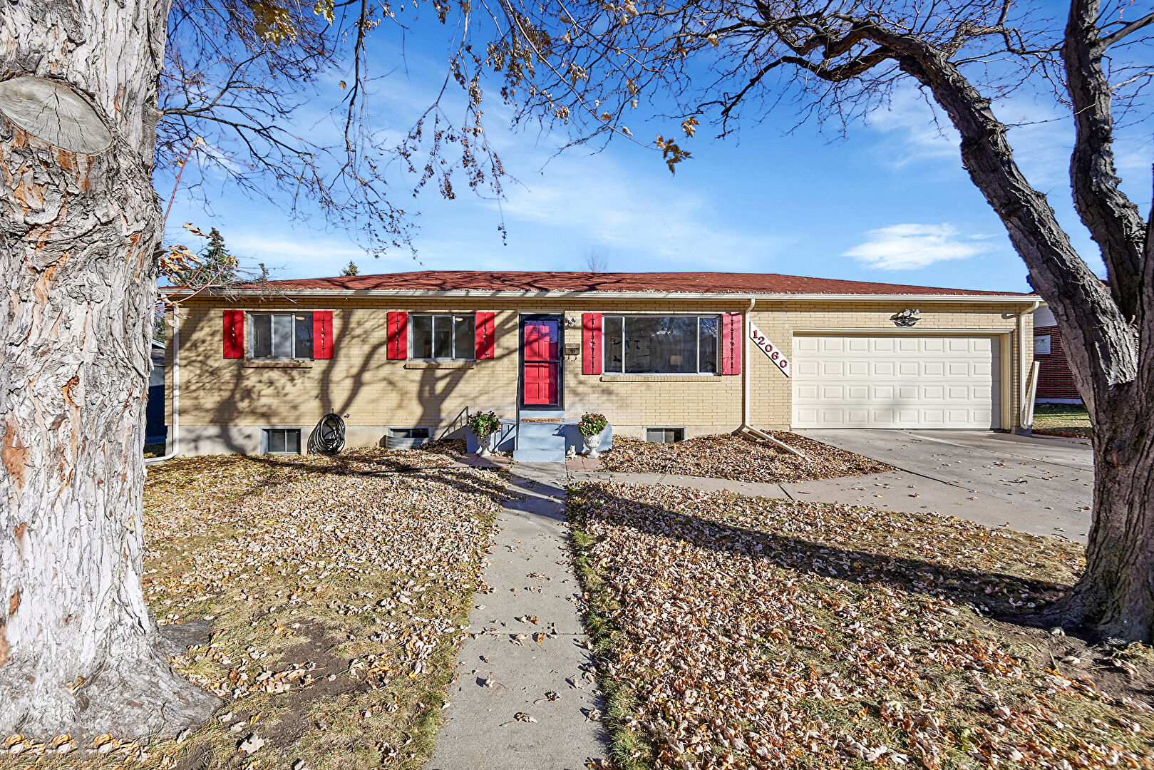 Front at 12060 West Dakota Drive, Lakewood, CO 80228, listed by Trish Kelly