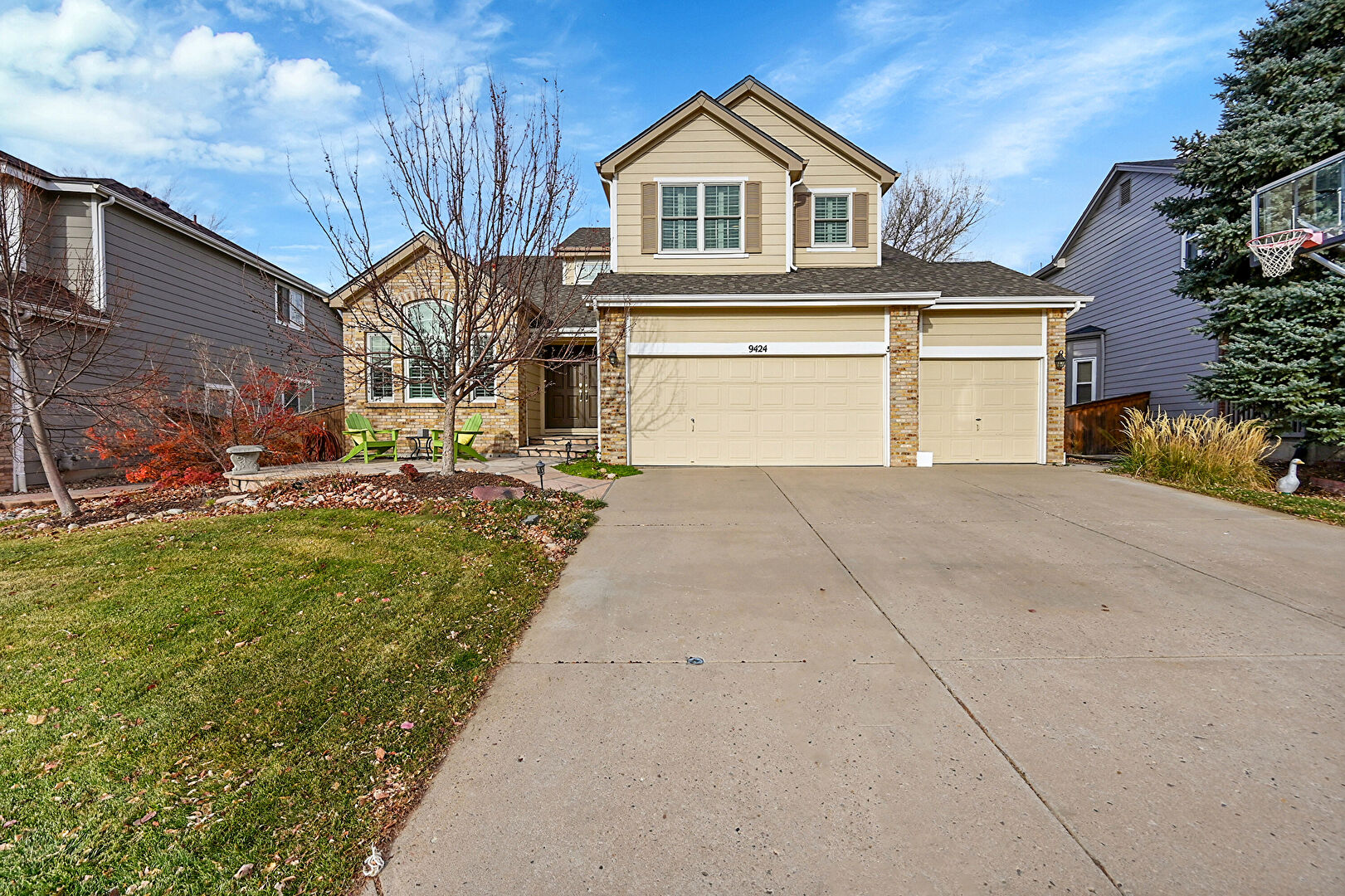 Front at 9424 South Hackberry Lane, Highlands Ranch, CO 80129, listed by Renee Anderson