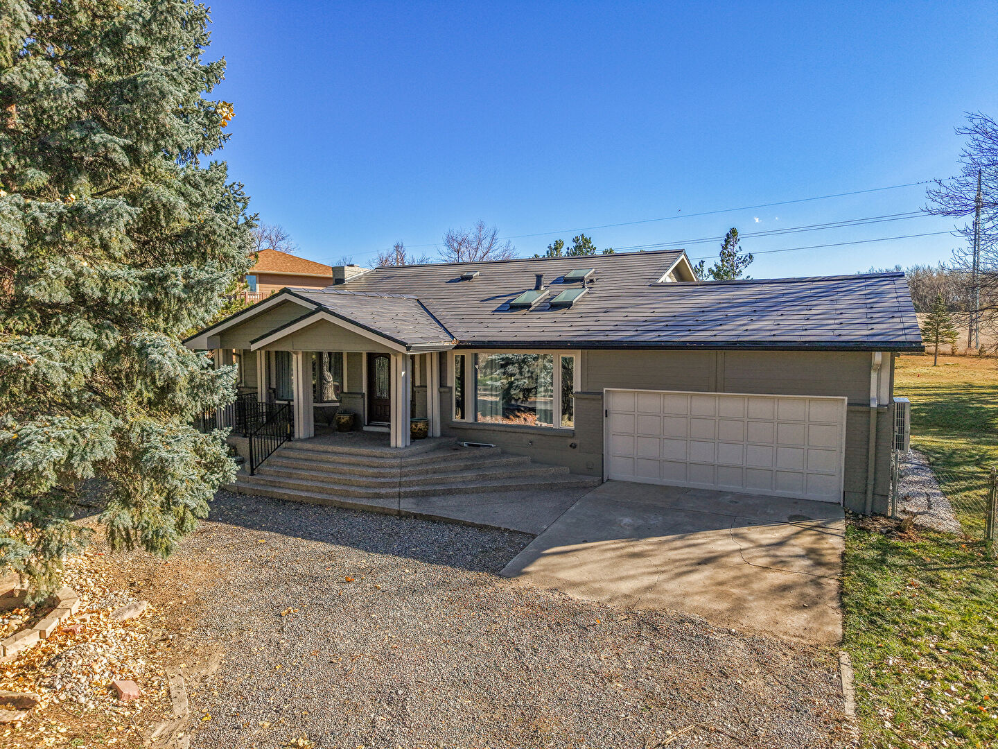 Front at 9032 Tahoe Ln., Boulder, CO 80301, listed by The Bernardi Group