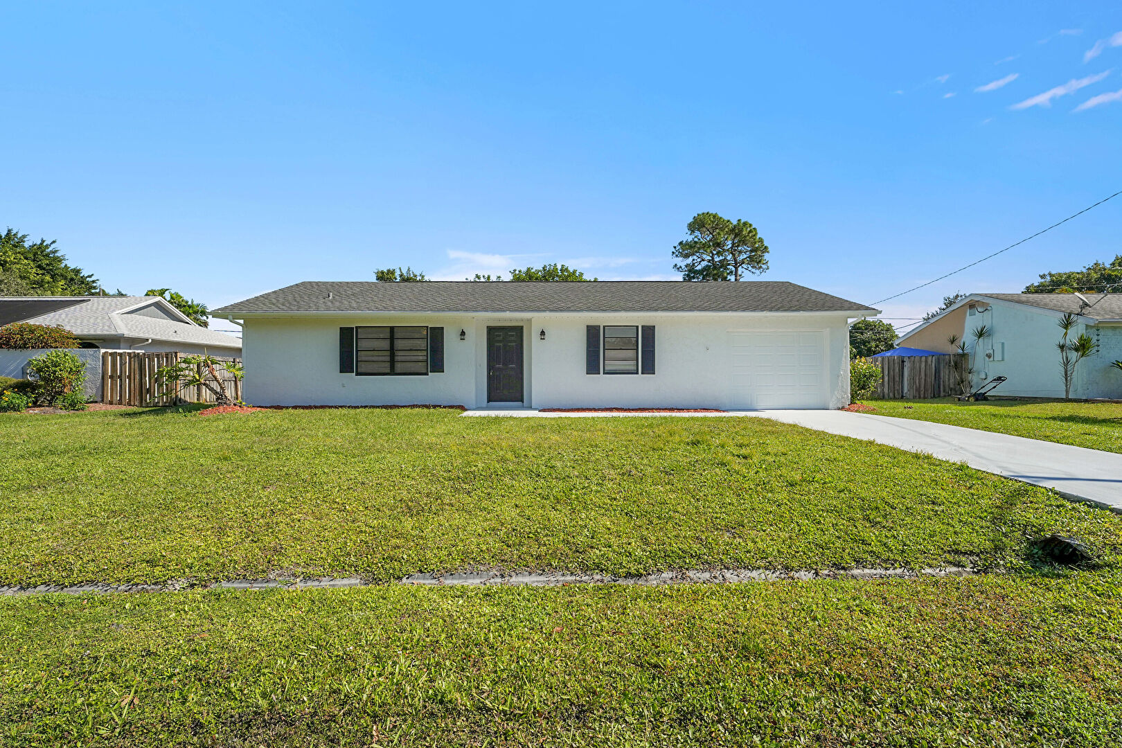 Front at 2251 Southeast Holland Street, Port St. Lucie, FL 34952, listed by Jason M Coley