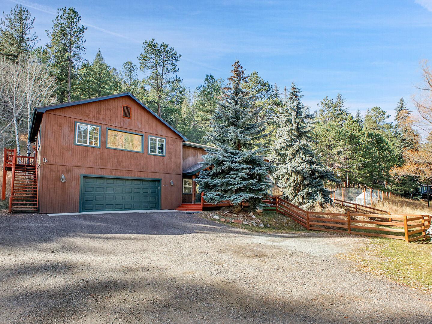 Front at 4961 Little Cub Creek Road, Evergreen, CO 80439, listed by Nicholas Kostecki