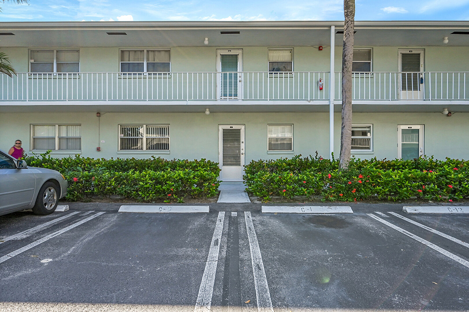Front at 2340 Southwest 22nd Avenue, Unit 303, Delray Beach, FL 33445, listed by Thomas (Tom) Fleming