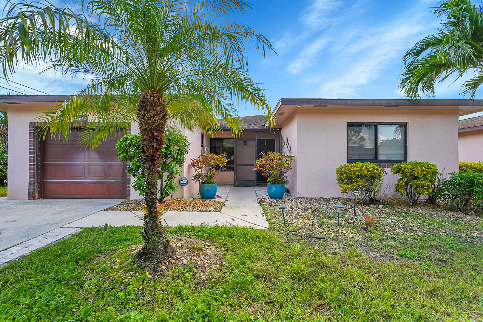 Front at 14664 Bonaire Boulevard, Delray Beach, FL 33446, listed by Valentina Lowe-Bowen