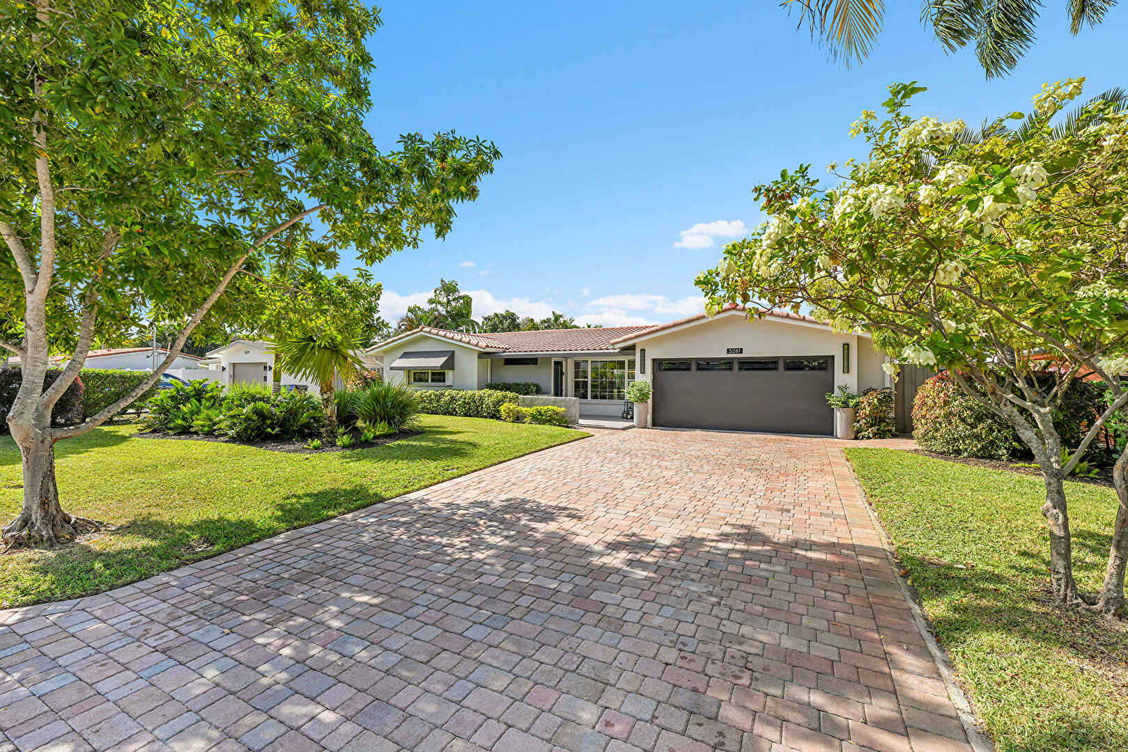 Front at 5281 Northeast 19th Avenue, Fort Lauderdale, FL 33308, listed by Robert Russotto