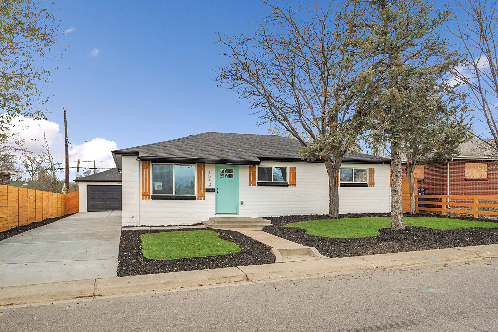Front at 1540 West 52nd Avenue, Denver, CO 80221, listed by Eric Ybarra