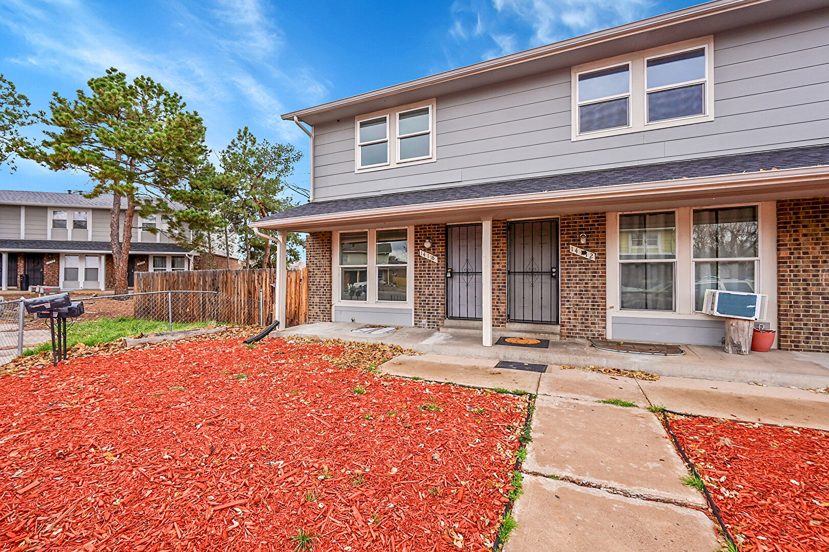 Front at 14118 E 22nd Pl, Aurora, CO 80011, listed by Bao Le