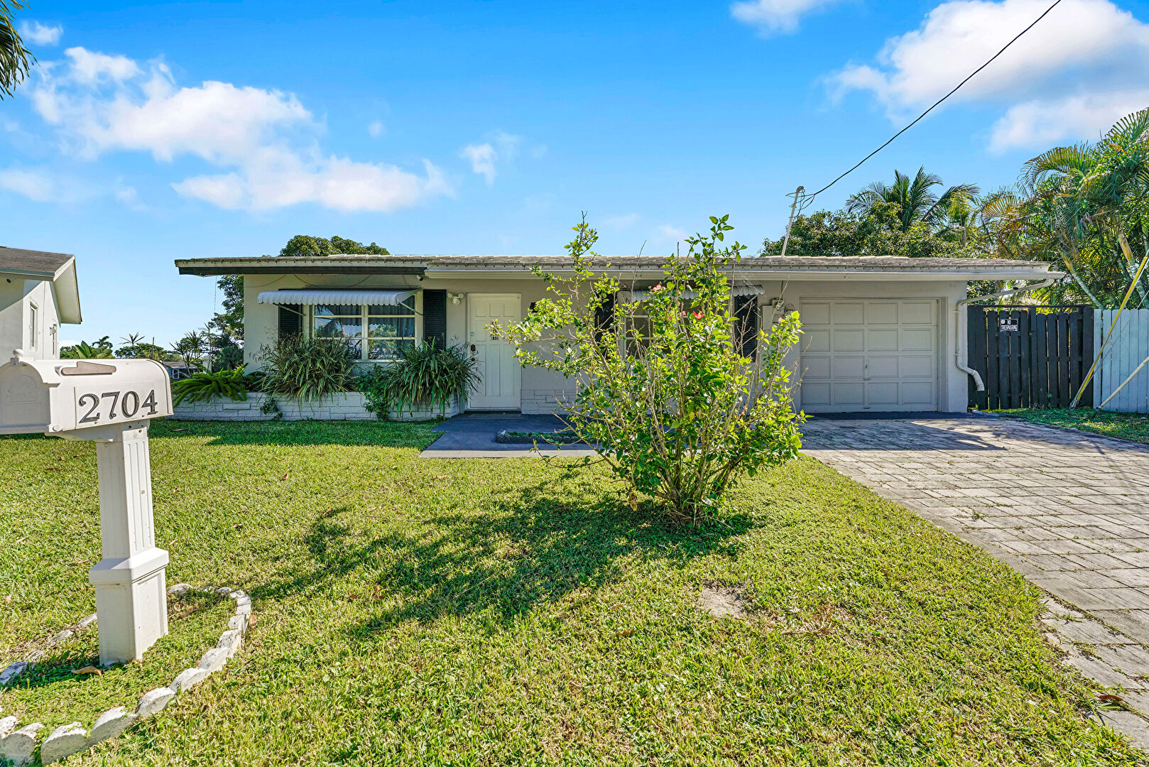 Front at 2704 Northwest 48th Street, Fort Lauderdale, FL 33309, listed by Taylor Haslam, MLS ID: F10538035