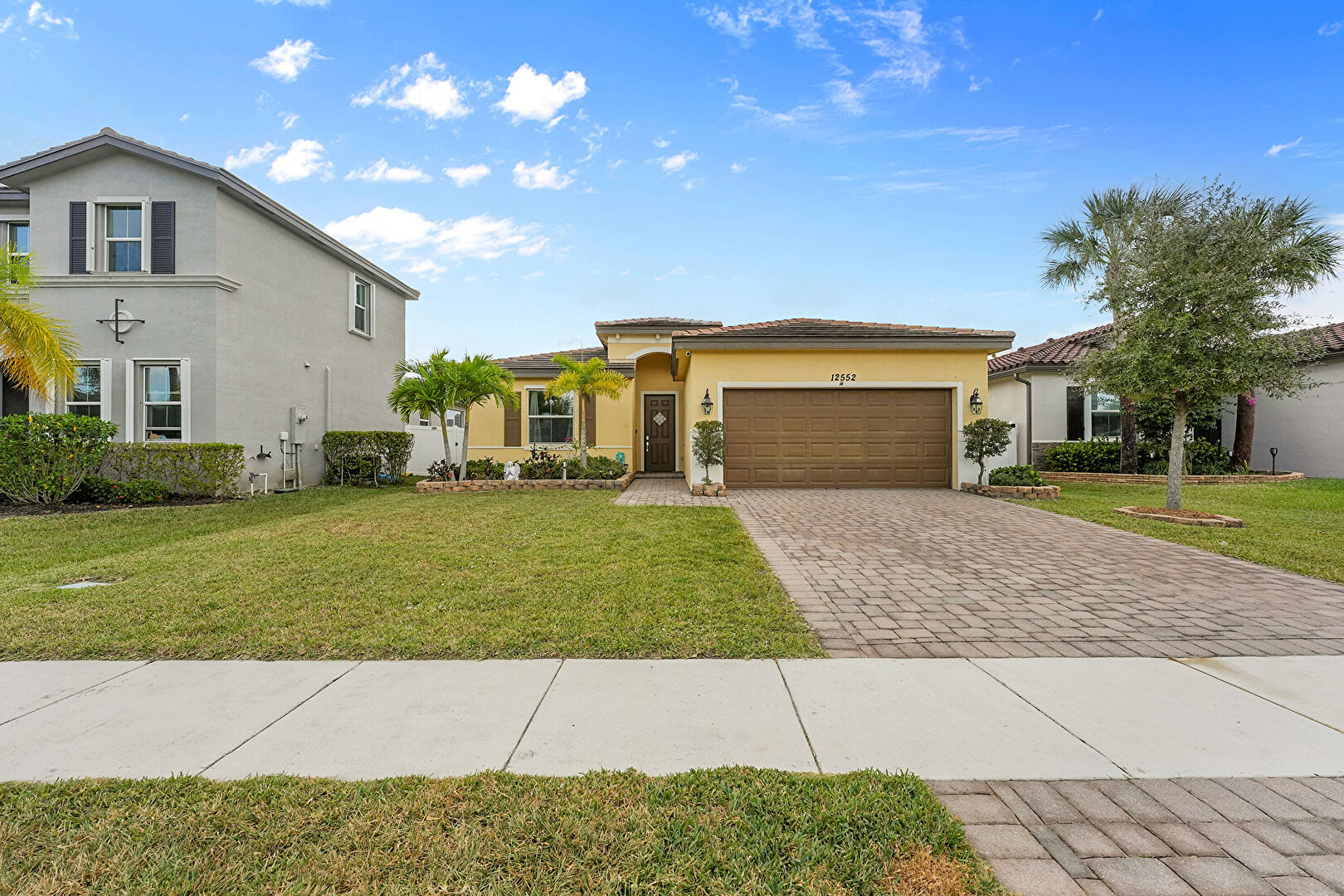 Front at 12552 Northwest Toblin Lane, Port St. Lucie, FL 34987, listed by Sabrina McClover
