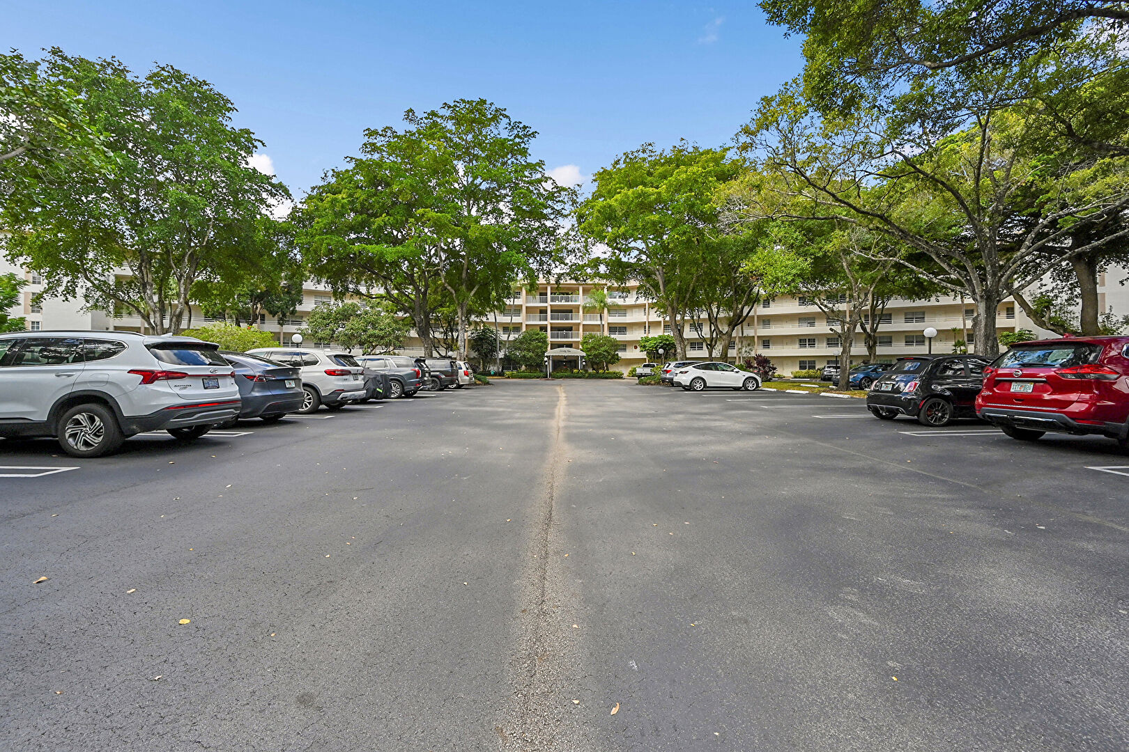 Parking at 3980 Oaks Clubhouse Drive, 505, Pompano Beach, FL 33069, listed by Cynthia Heelan