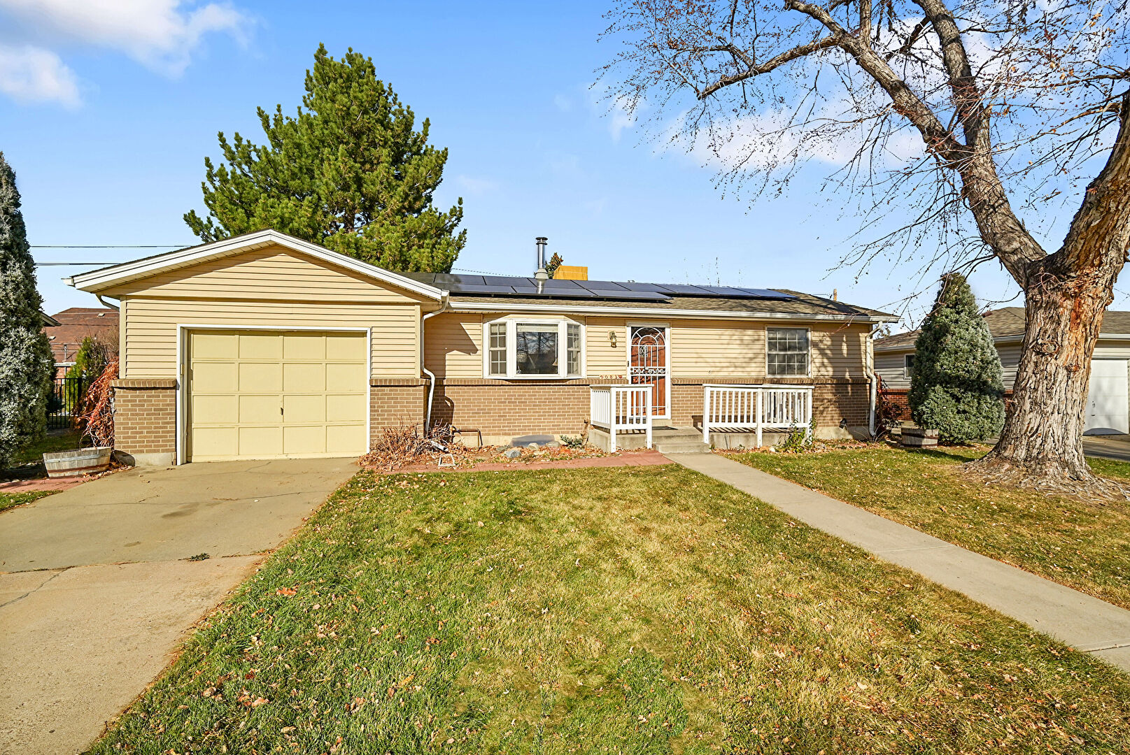 Front at 9083 West Iowa Avenue, Lakewood, CO 80232, listed by Carl Dire