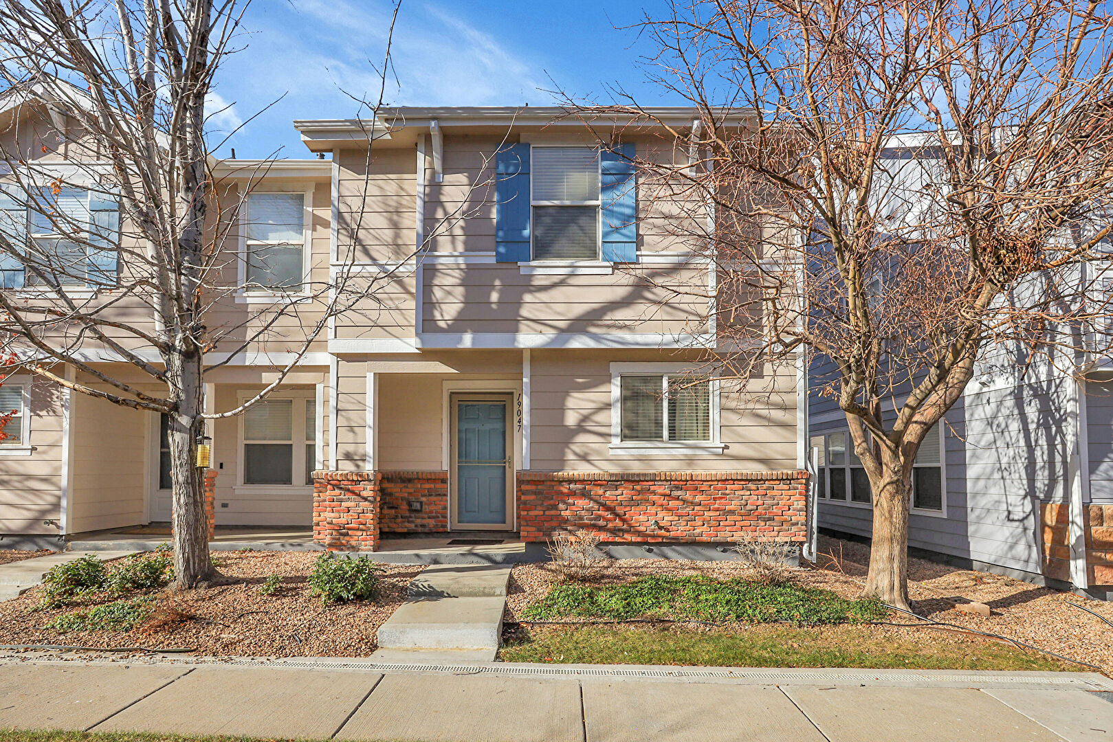 Front at 19047 East 57th Place, Denver, CO 80249, listed by Anita Satchell, MLS ID: 7797696