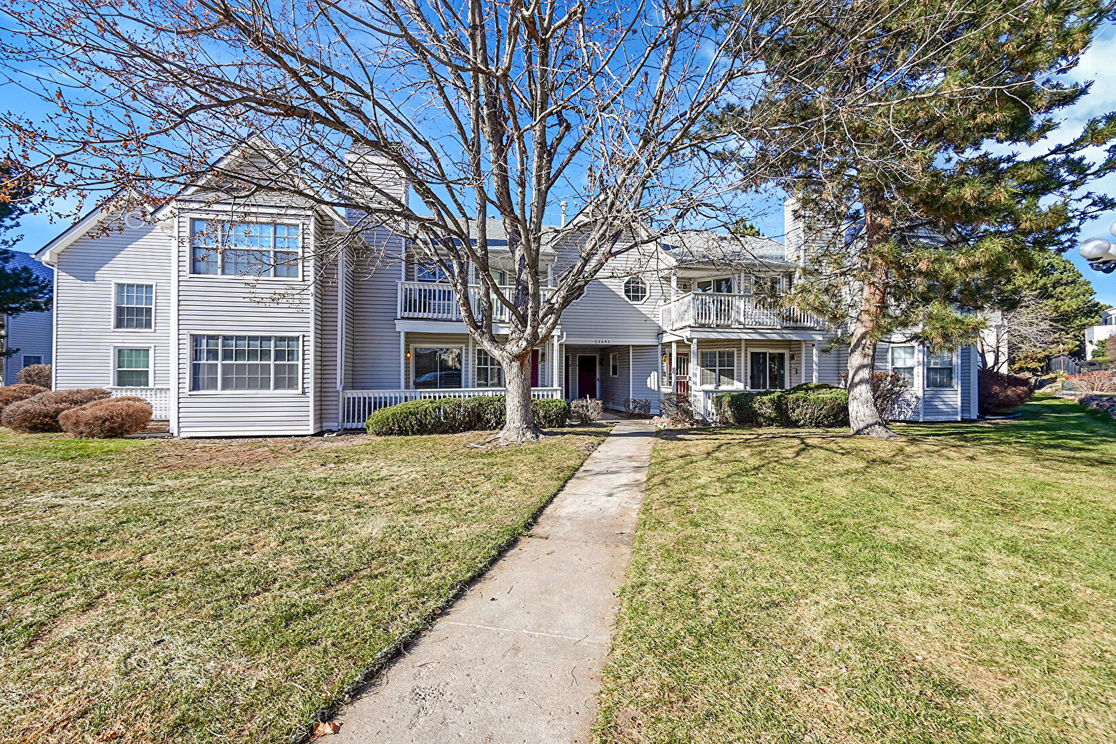 Front at 12685 East Pacific Cir #C, Aurora, CO 80014, listed by Susan Gutierrez