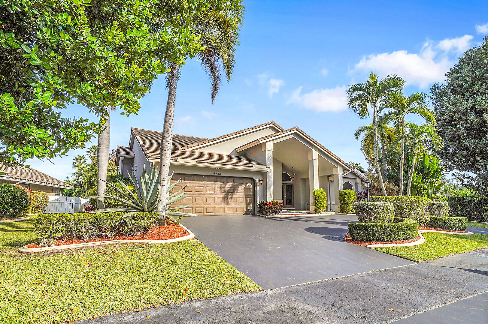 Front at 4983 Northwest 107th Avenue, Coral Springs, FL 33076, listed by Laura Sanders, MLS ID: F10539130