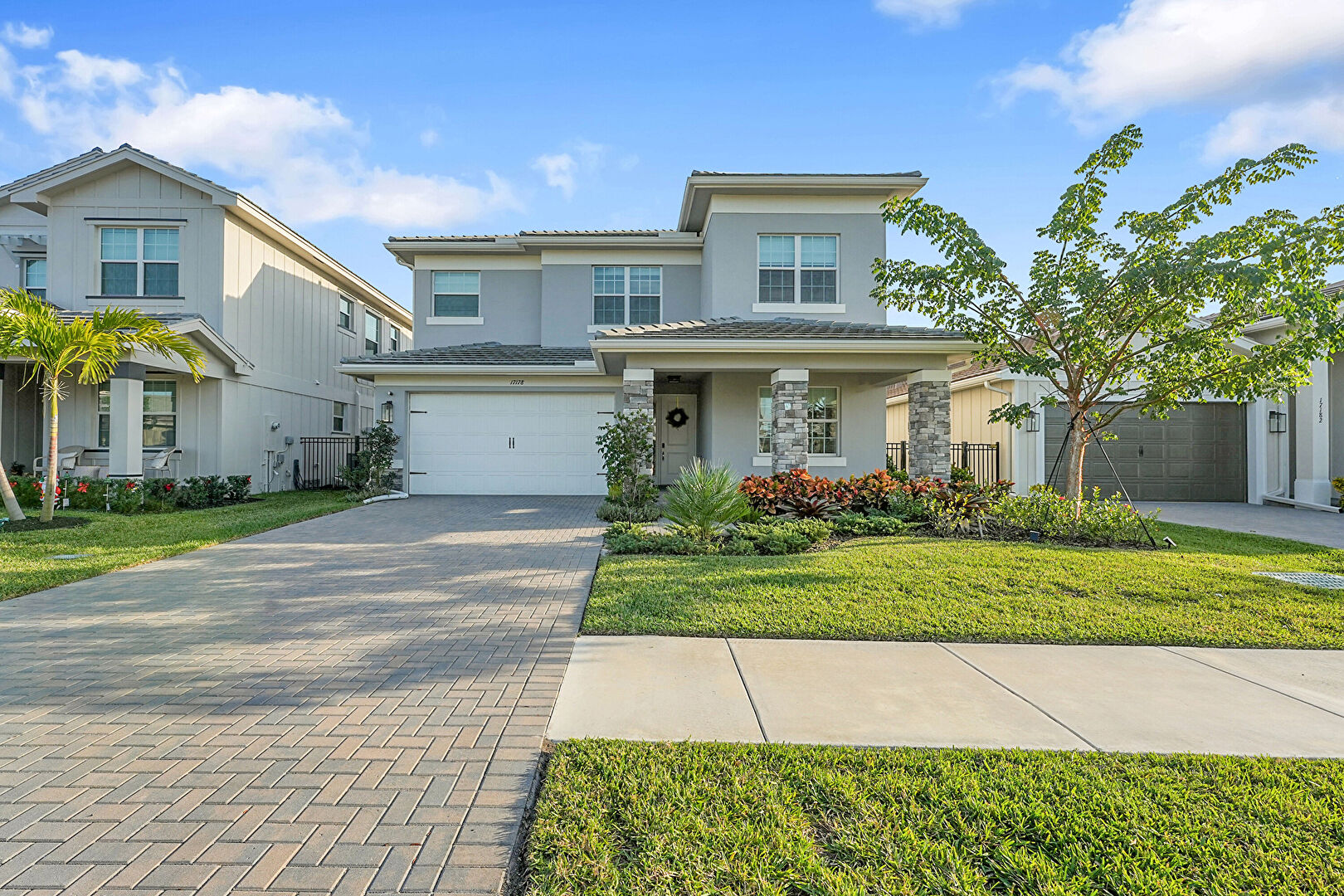 Front at 17178 Tawny Owl Trail, loxahatchee, FL 33470, listed by Milva Gilluly