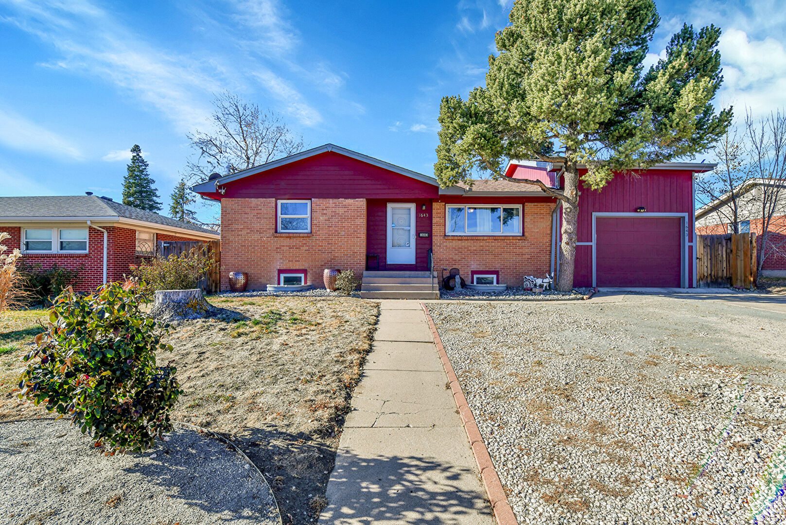 Front at 1643 S Quitman Street, Denver, CO 80219, listed by Verna Crosato