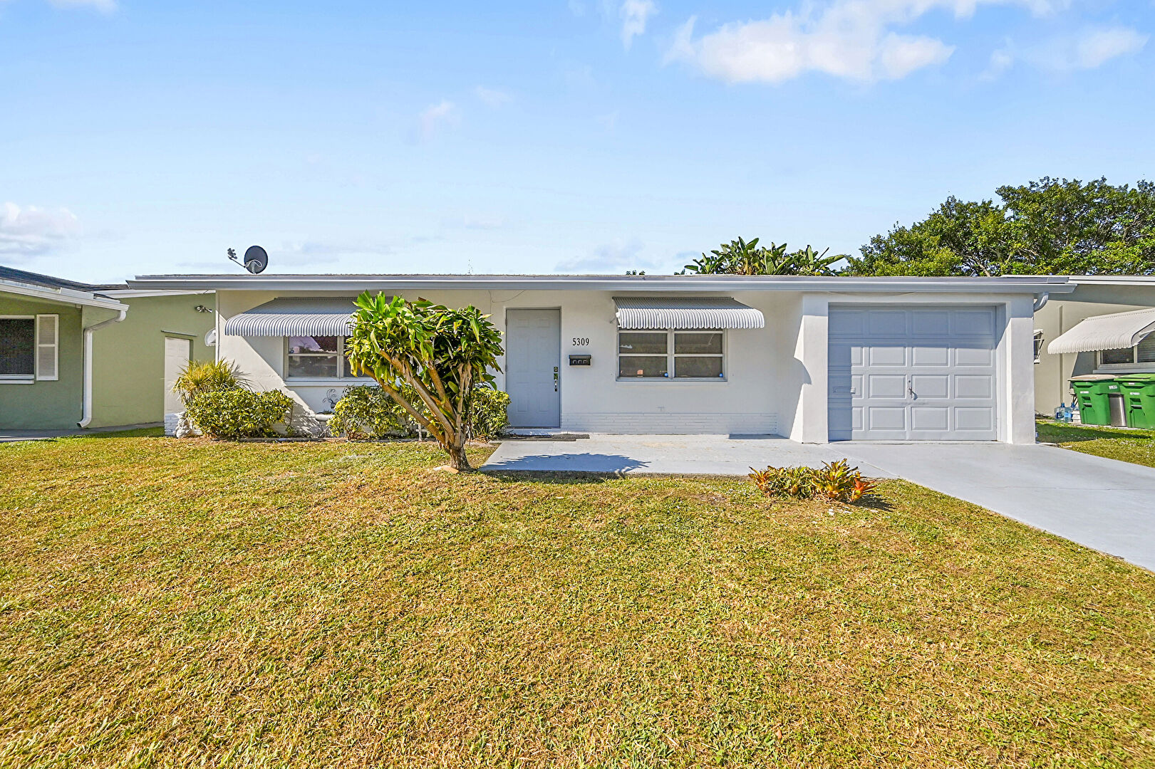 Front at 5309 Northwest 49th Avenue, Tamarac, FL 33319, listed by Tristan Beavers
