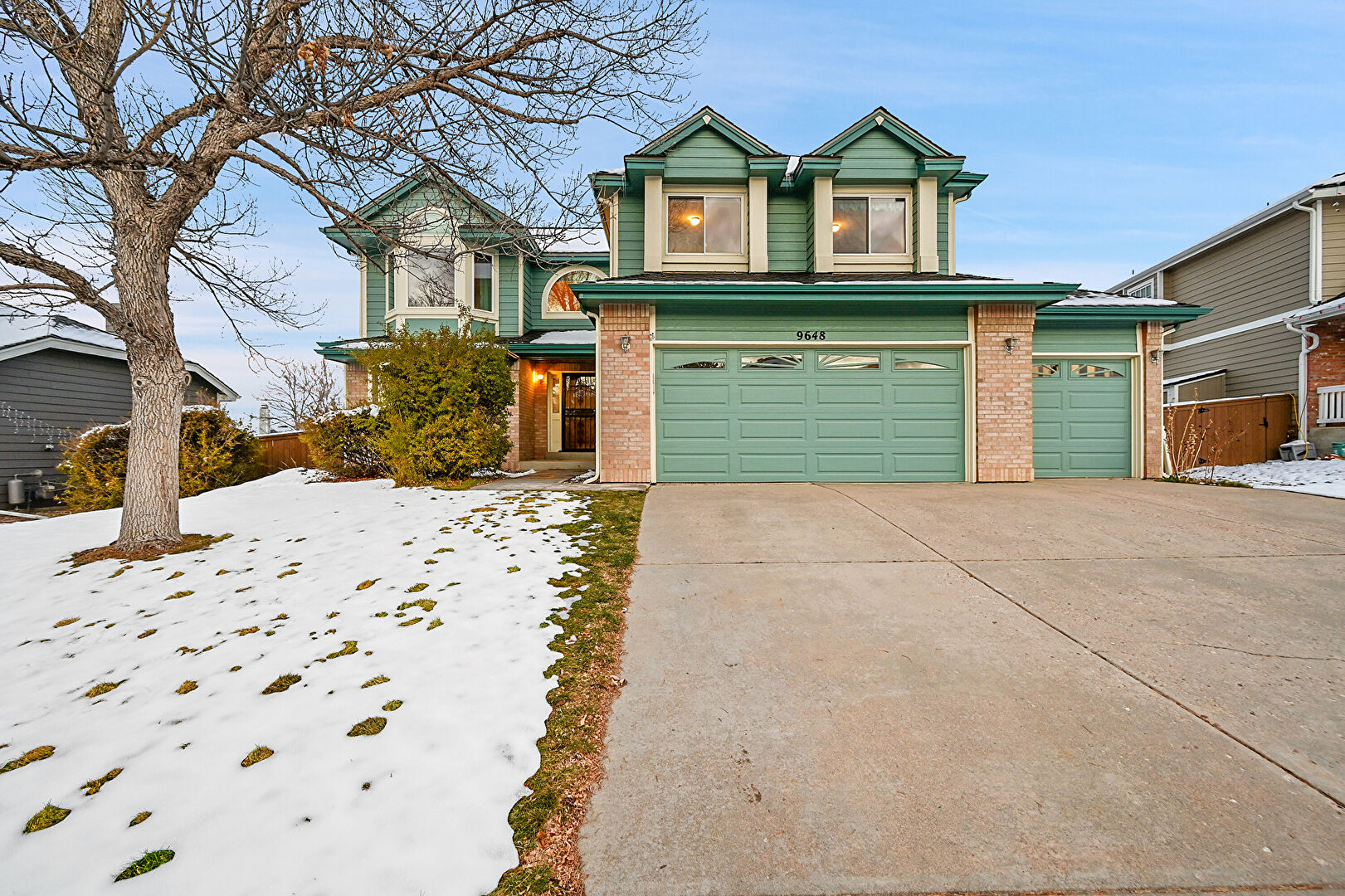 Front at 9648 Bellmore Place, Littleton, CO 80126, listed by Greg Livingston