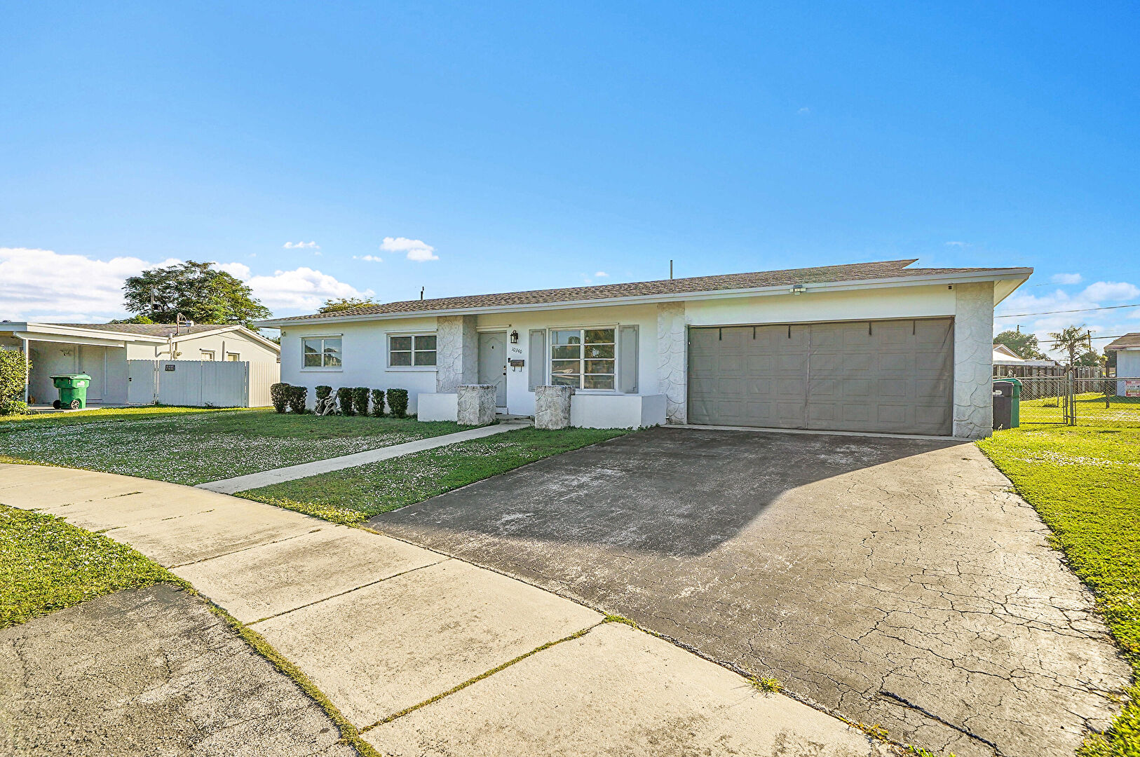 Front at 10340 Southwest 157th Street, Miami, FL 33157, listed by Hamne Raez