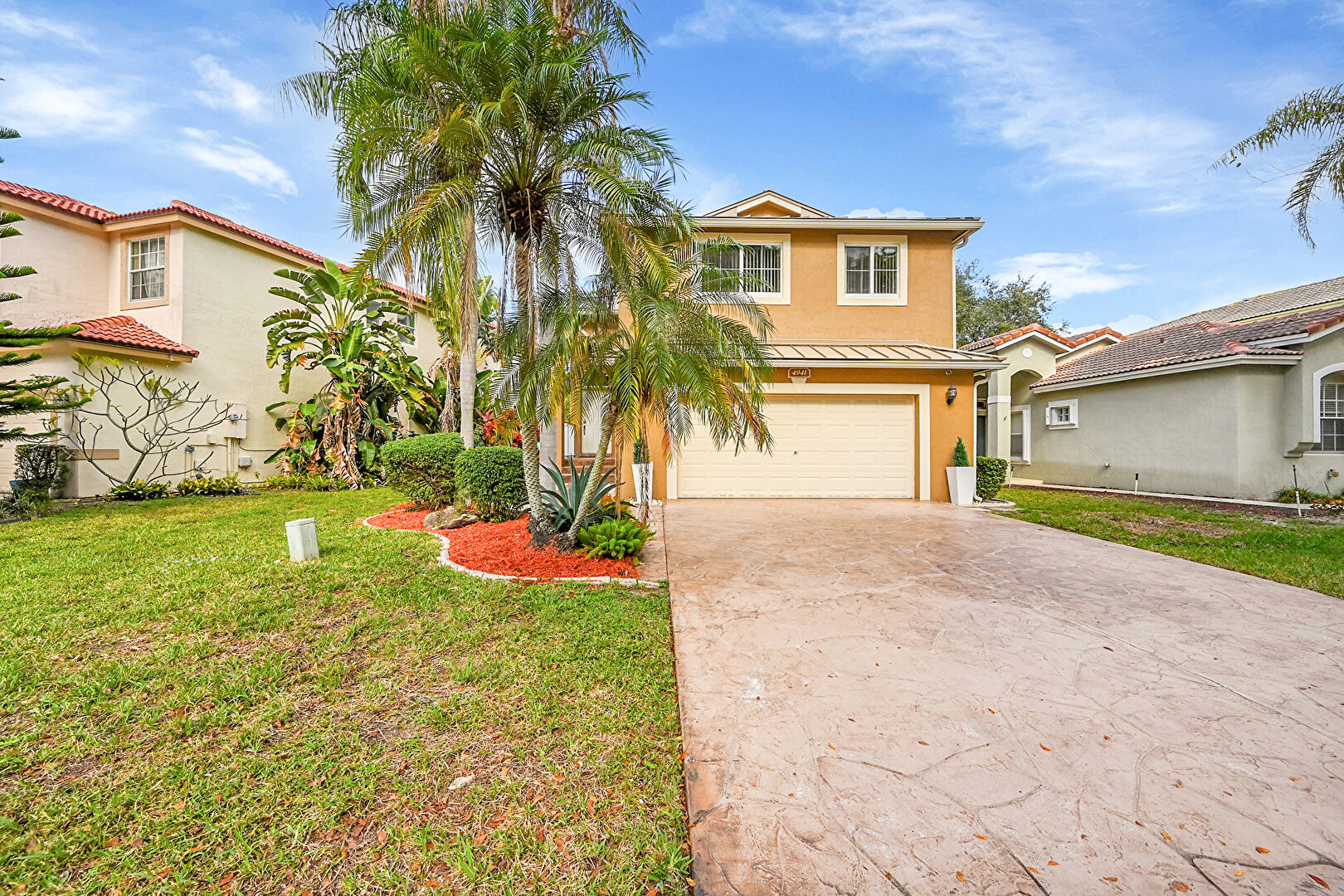 Front at 4941 Pelican Street, Coconut Creek, FL 33067, listed by Gloria Heck