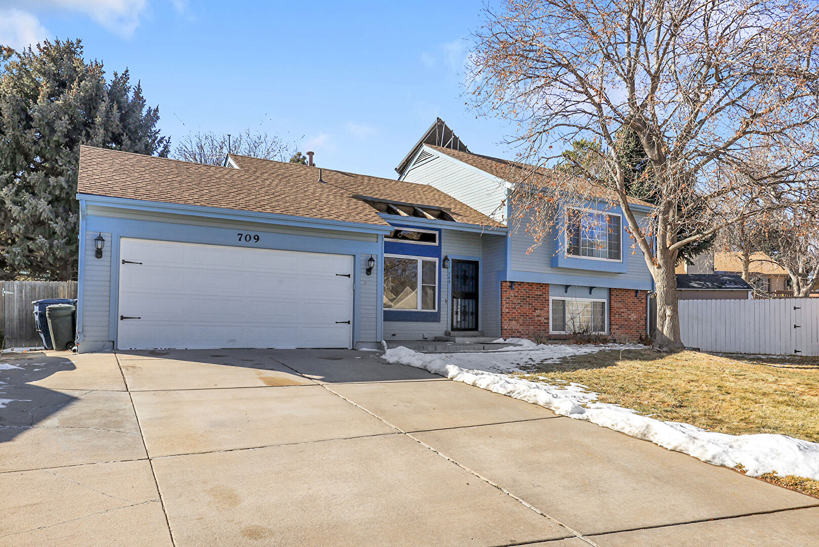 Front at 709 South Granby Circle, Aurora, CO 80012, listed by Lauren Weiss