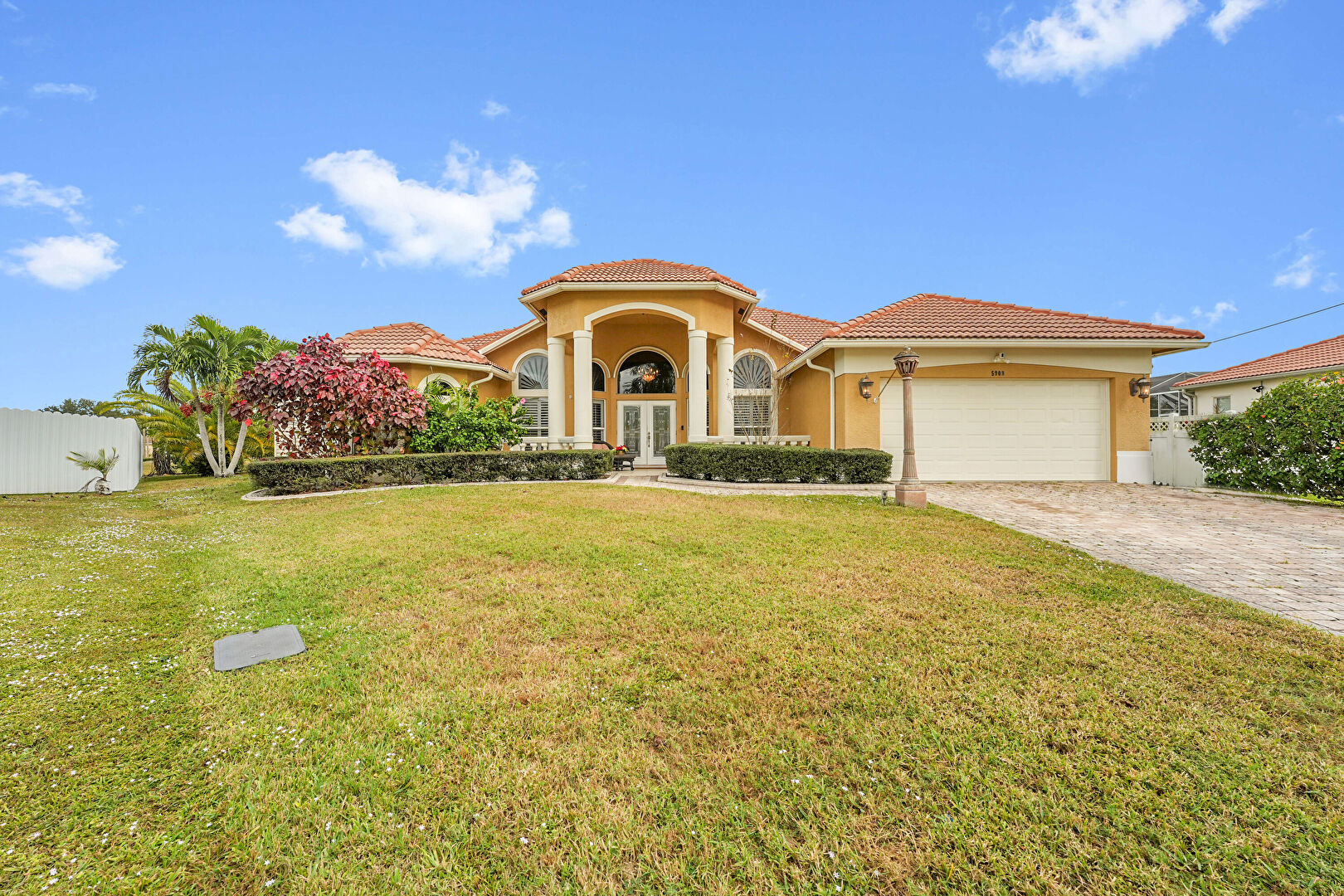 Front at 5909 Northwest Bayou Court, Port St. Lucie, FL 34986, listed by Teresita Amado
