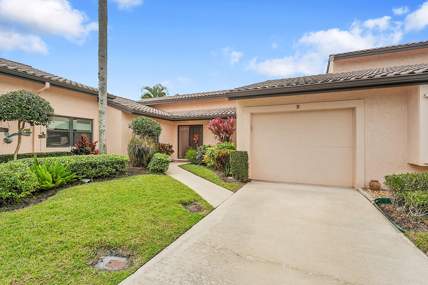 Front at 3584 Southwest Quail Meadow Trail, Unit B, Palm City, FL 34990, listed by Lissette Burba