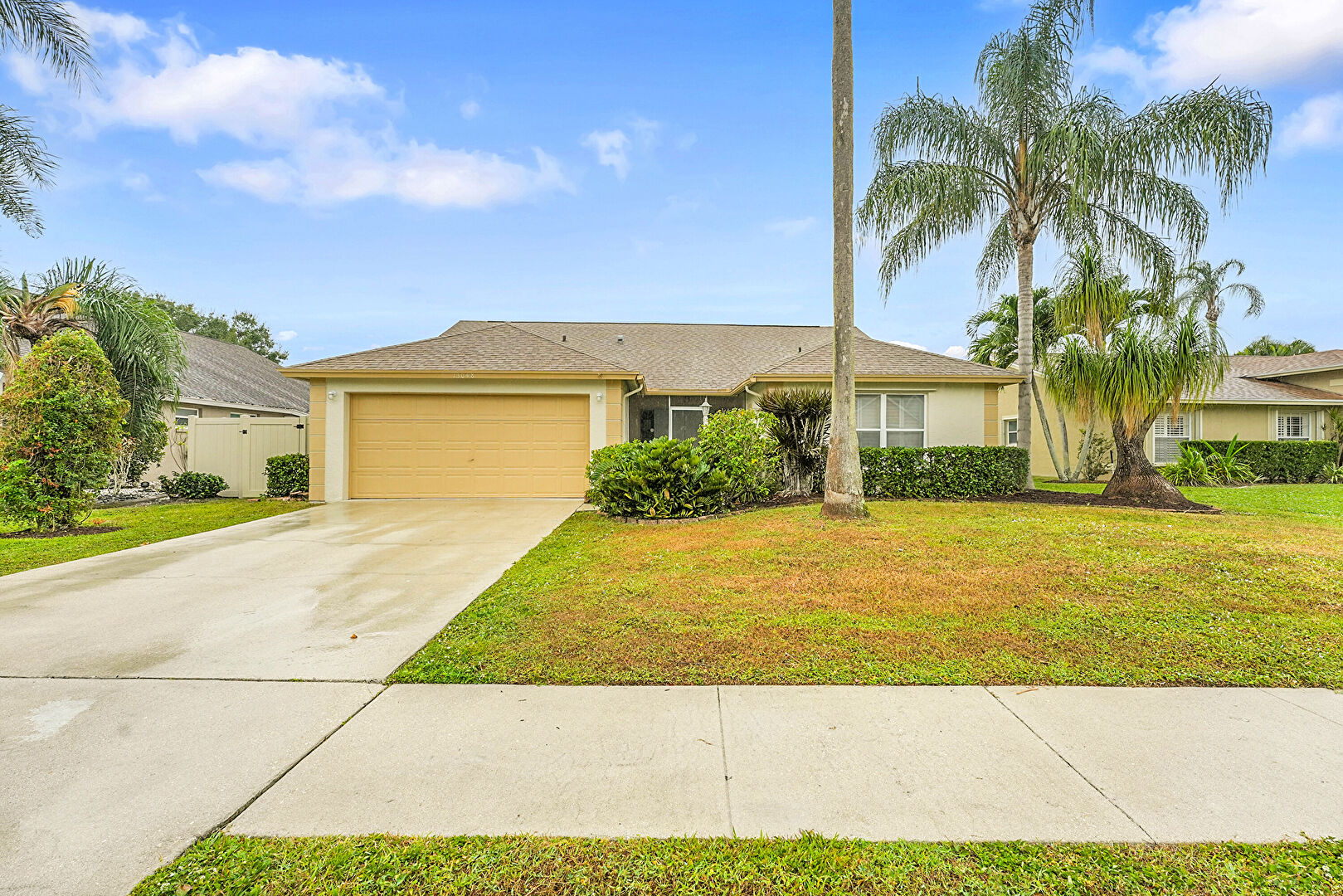 Front at 13048 Meadowbreeze Drive, Wellington, FL 33414, listed by Ravi Mohanka