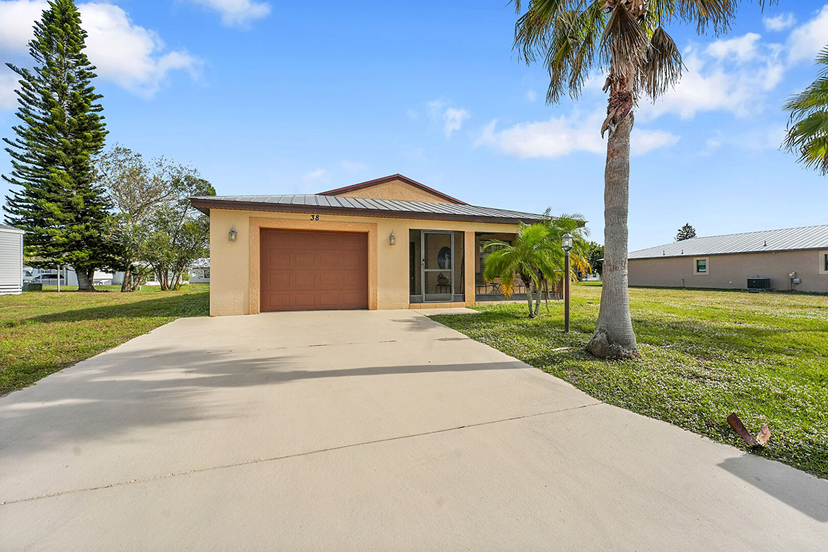 Front at 38 Alta Loma, Spanish lakes, Port St. Lucie, FL 34952, listed by Margaret Good