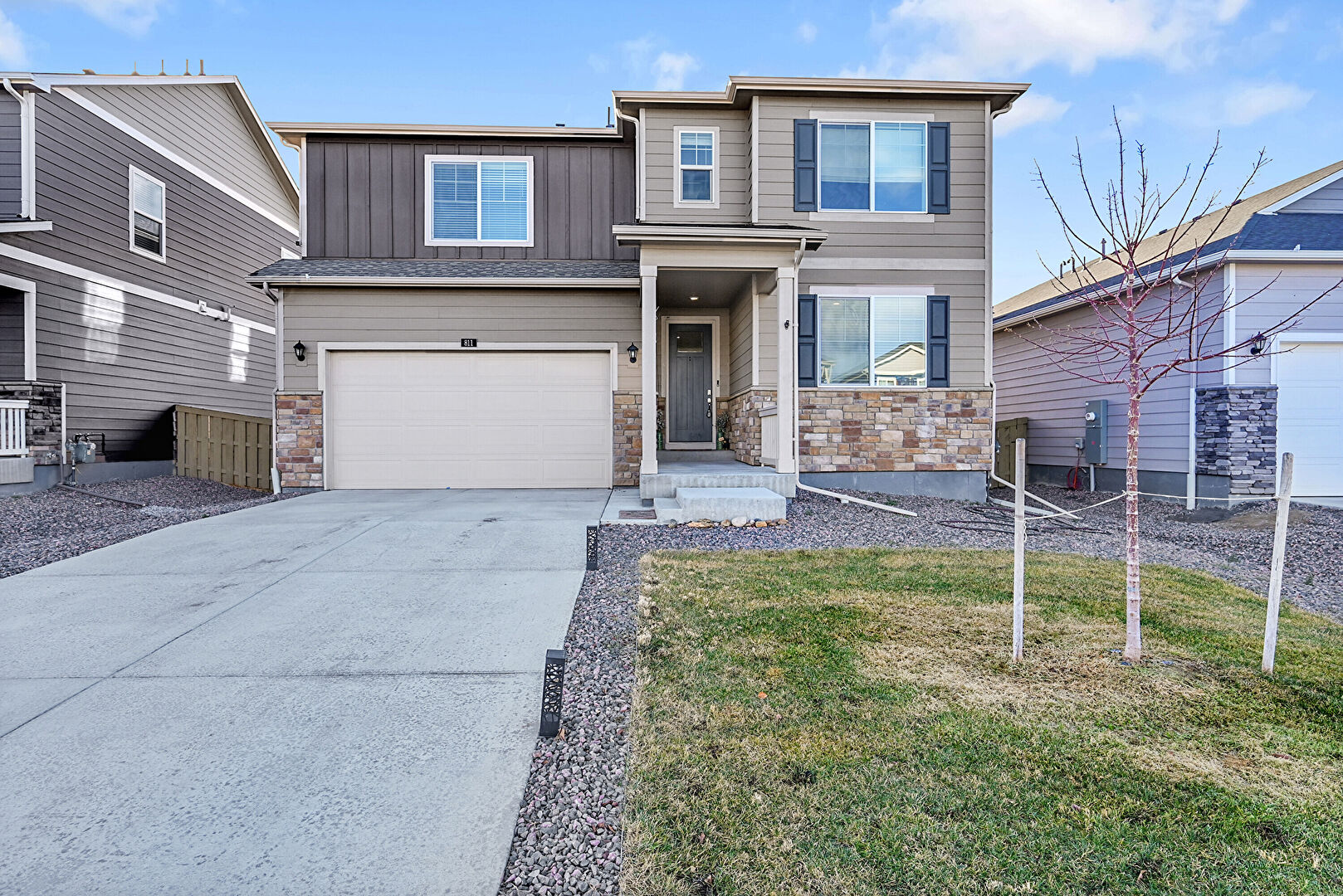 Front at 811 Elias Tarn Drive, Severance, CO 80550, listed by Lindsey Crisanti