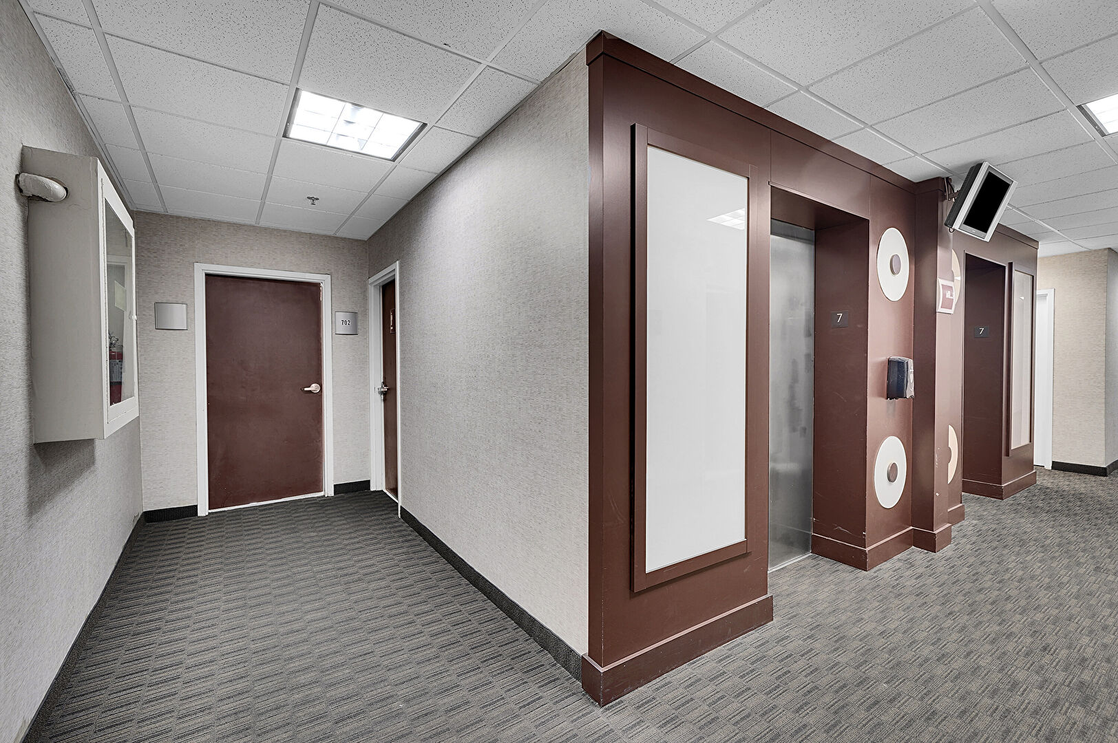 Hallway at 12550 Biscayne Boulevard, Unit 702, North Miami, FL 33181, listed by Taylor Haslam