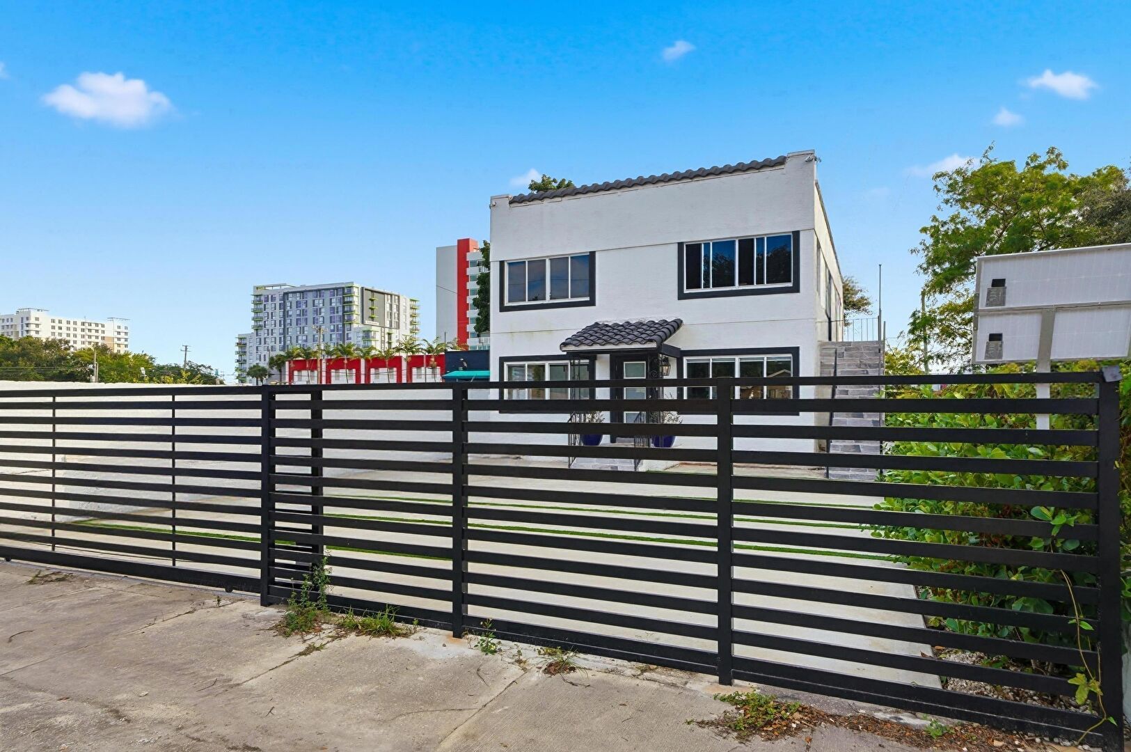 Gate at 1590 Northwest 38th Street, Miami, FL 33142, listed by Jewel Johnson