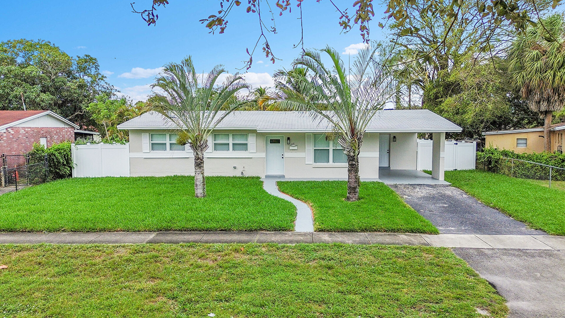 Front at 671 Northwest 37th Avenue, Fort Lauderdale, FL 33311, listed by Sonja Hall