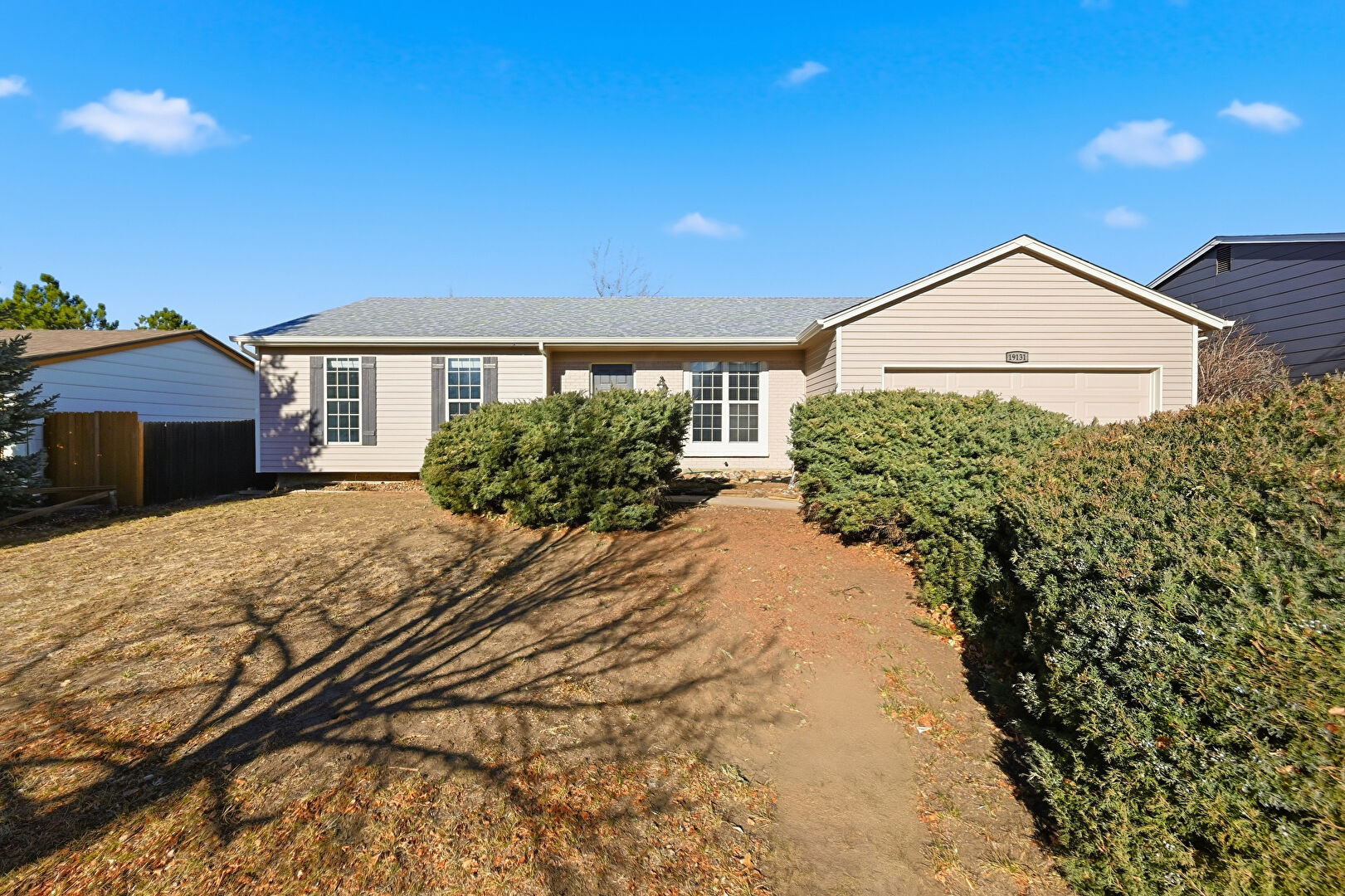Front at 19131 e. Louisiana ave, Aurora, CO 80017, listed by Chris Crowley