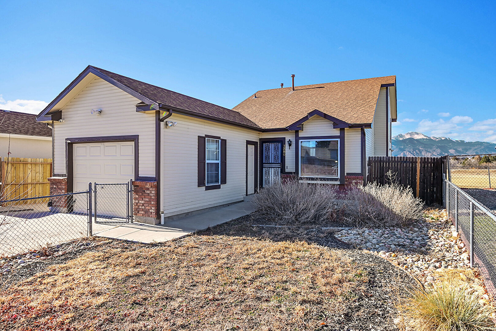 Front at 1380 Ride Lane, Colorado Springs, CO 80916, listed by Taylor Haas