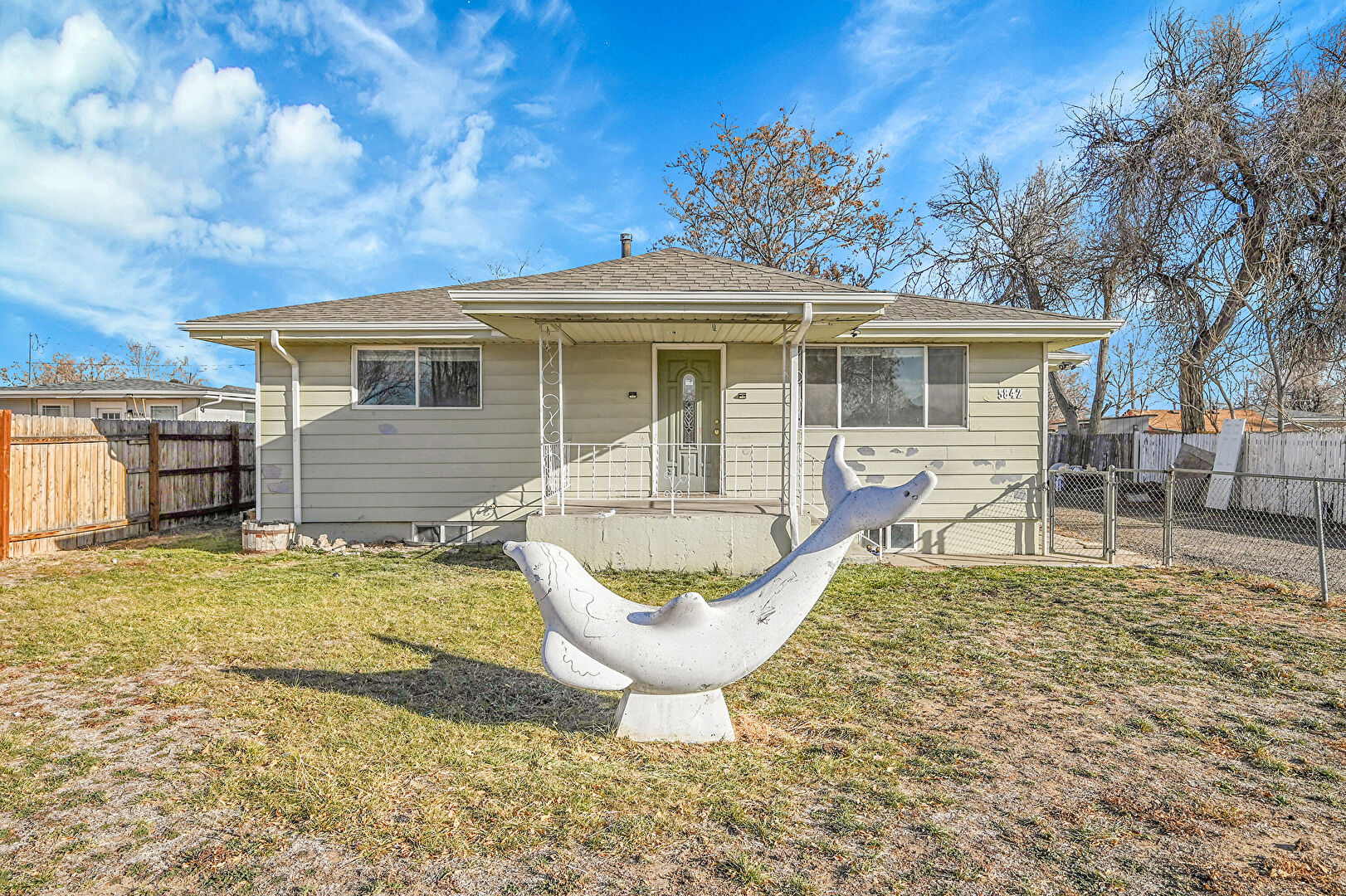 Living Room at 5842 Oneida Street, Commerce City, CO 80022, listed by Idalia Padilla