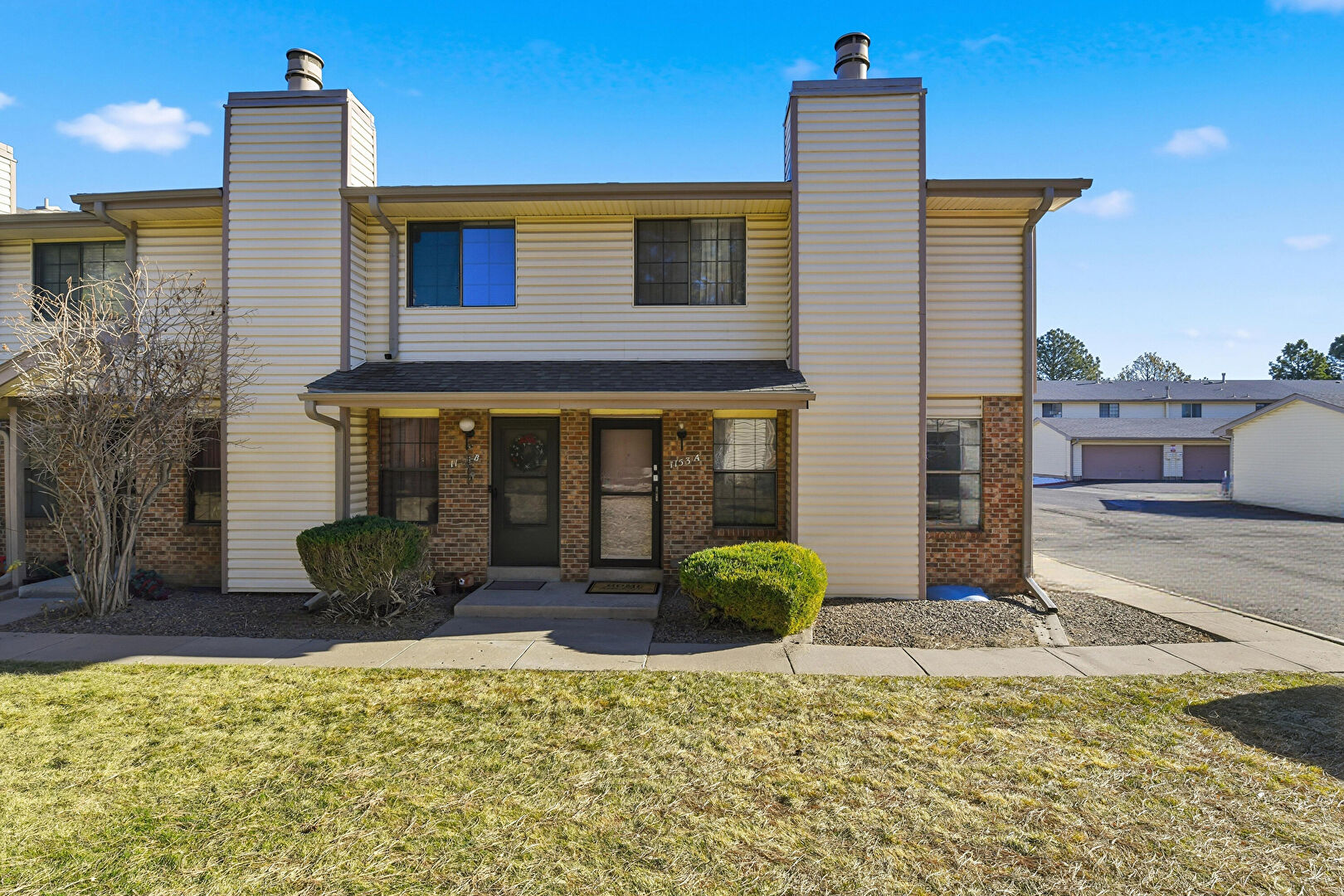 Front at 1153 South Sable Boulevard, Unit A, Aurora, CO 80012, listed by Mariafe Choi