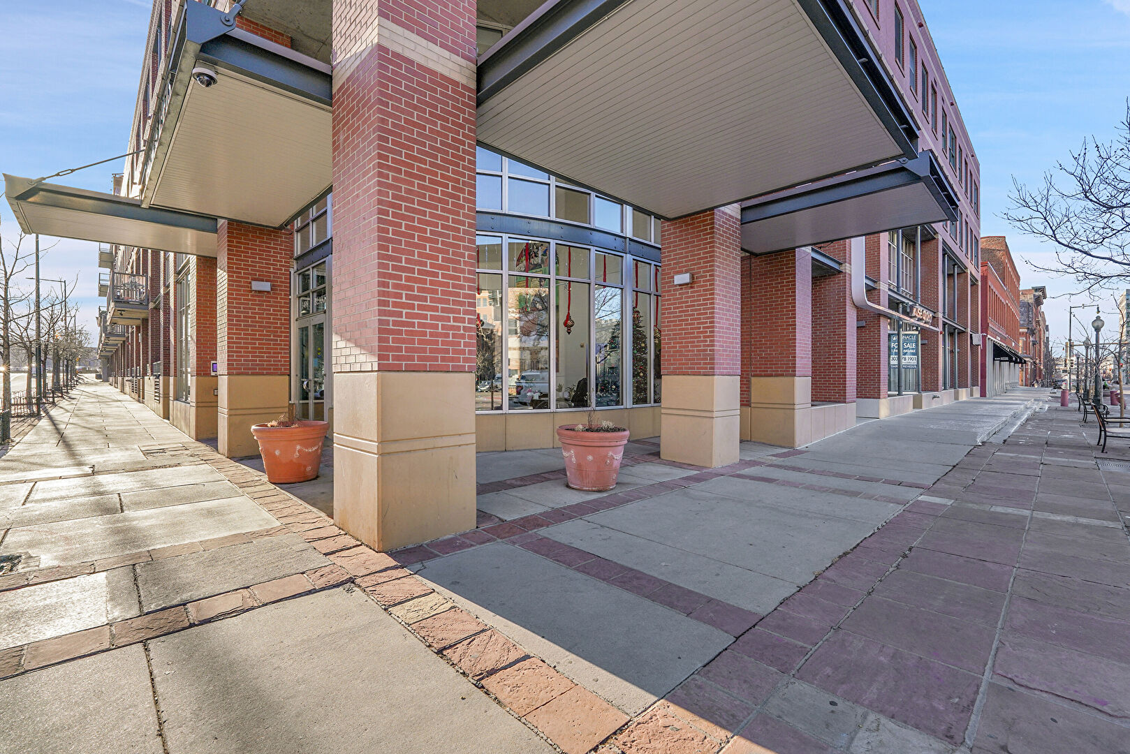Front at 1499 Blake Street, Unit 6H, Denver, CO 80202, listed by Dylan Lario
