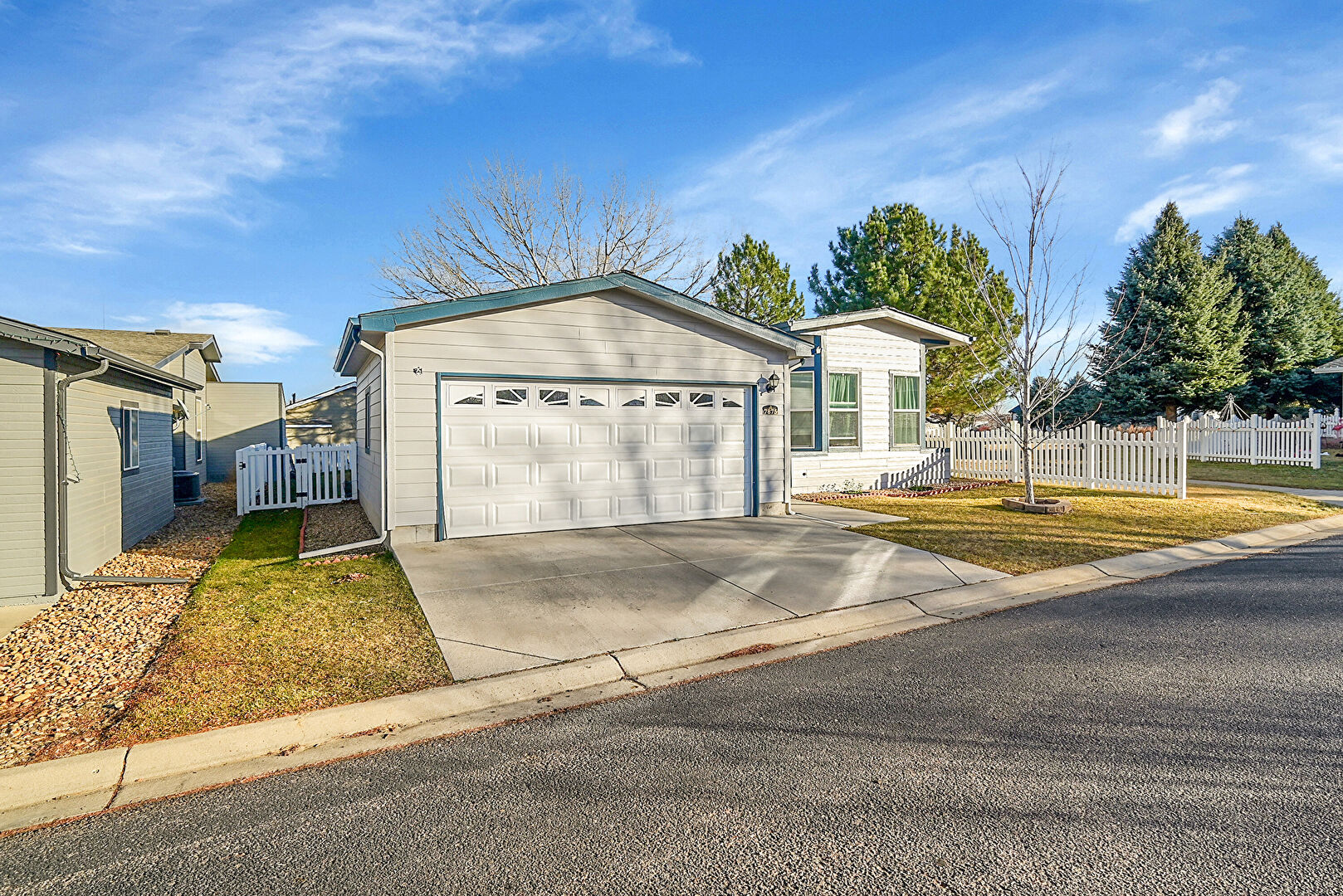 Front at 7875 Sunflower Green, Frederick, CO 80530, listed by Lorrie and Troy Lucero