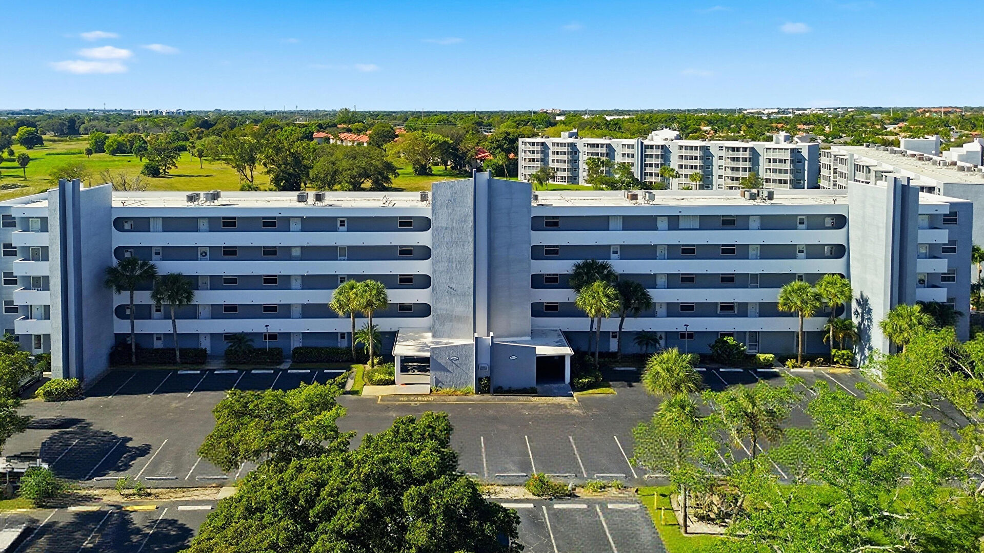 Front at 2601 S. Course Dr. #202, Pompano Beach, FL 33069, listed by Jason Fox