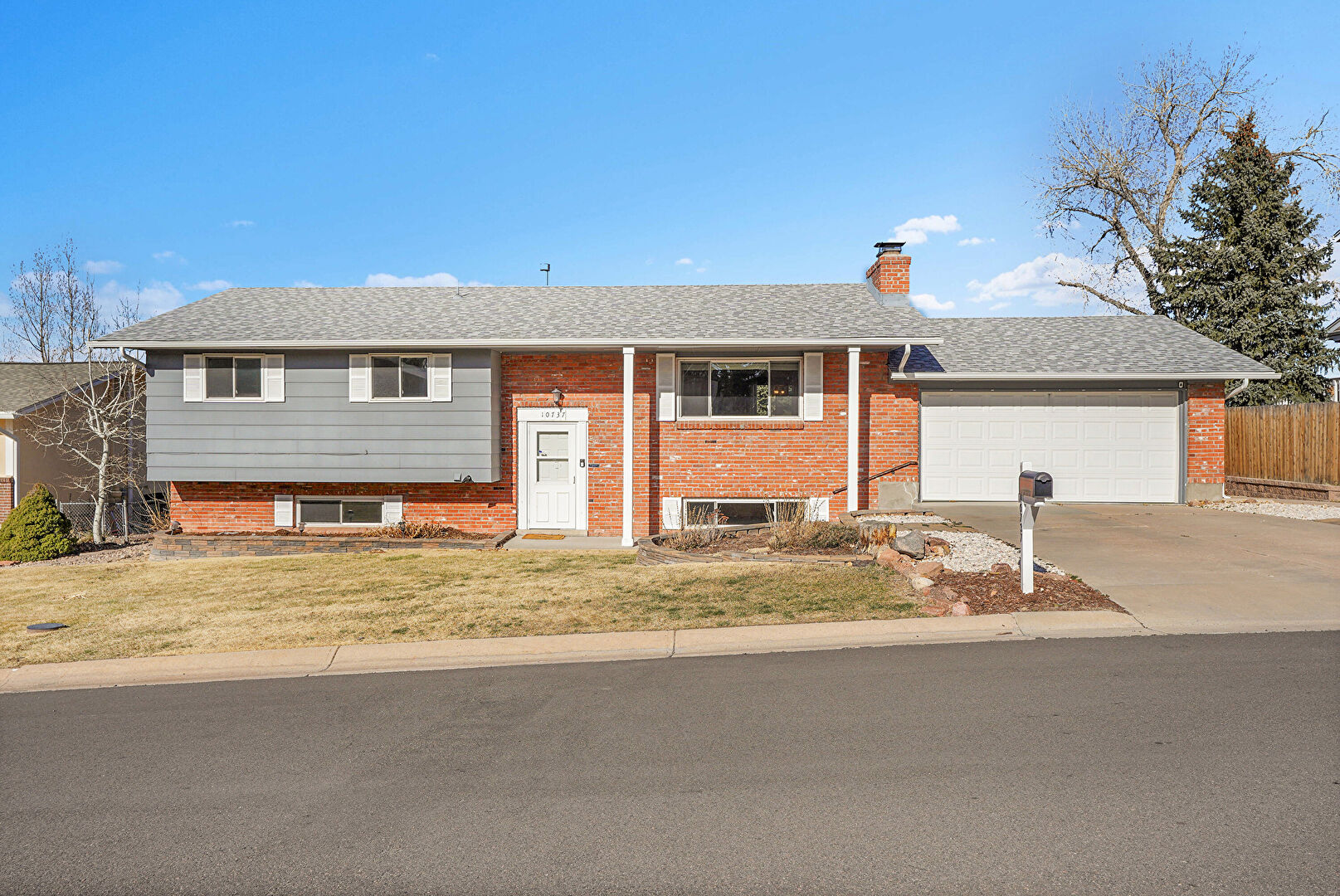 Front at 10737 West Tufts Drive, Littleton, CO 80127, listed by Kristen Spagnoletti