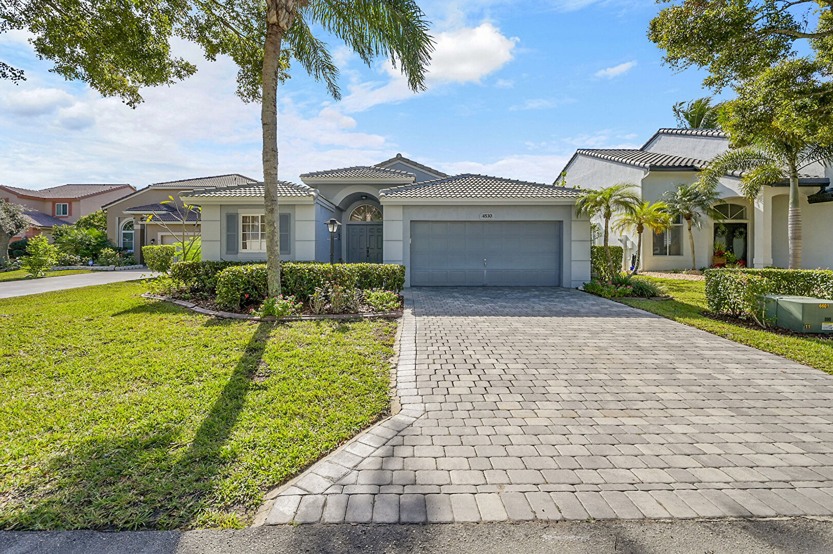 Front yard at 4530 Northwest 7th Street, Deerfield Beach, FL 33442, listed by David Phelps