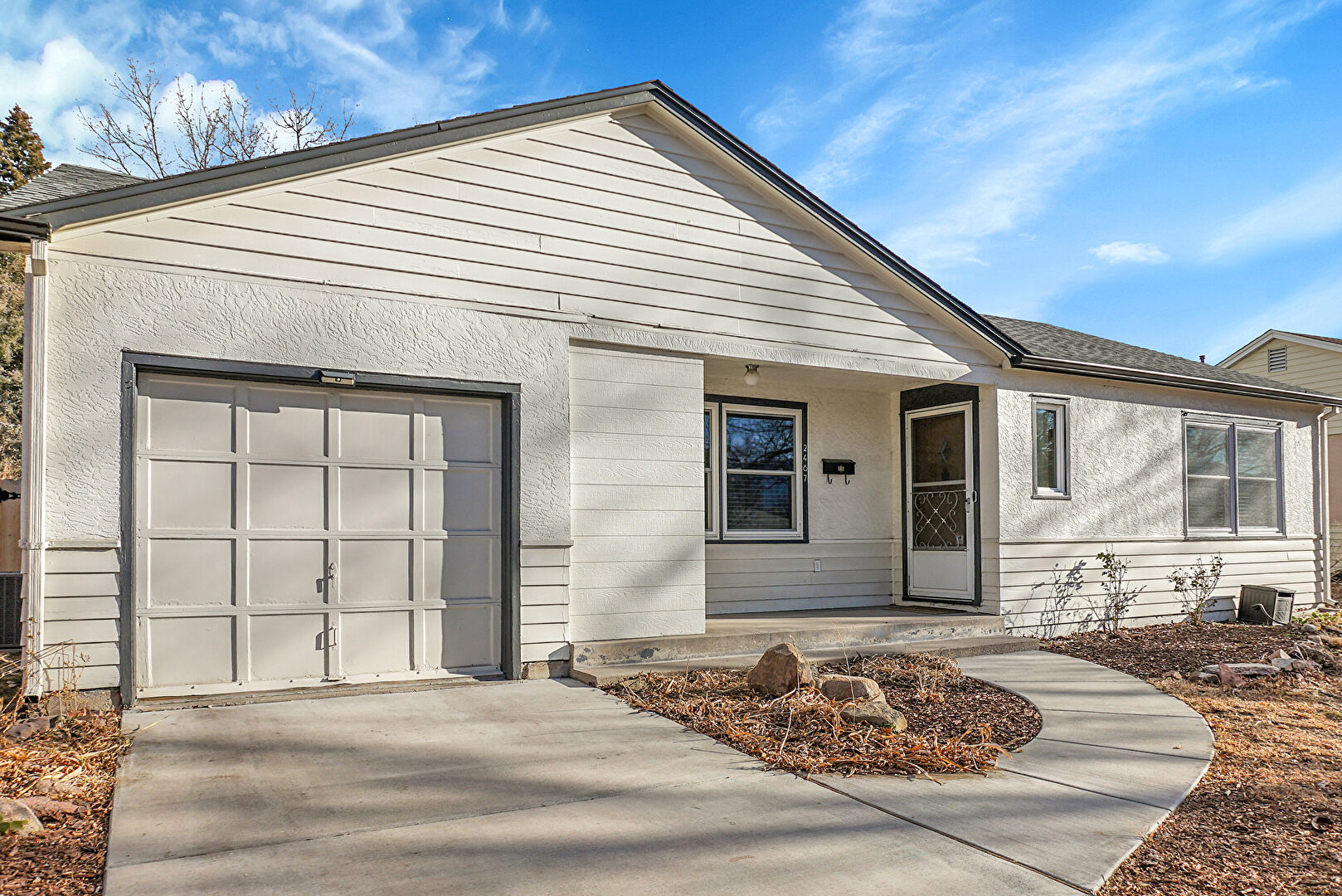 Front at 2467 Lafayette Road, Colorado Springs, CO 80907, listed by Jenny Daniels