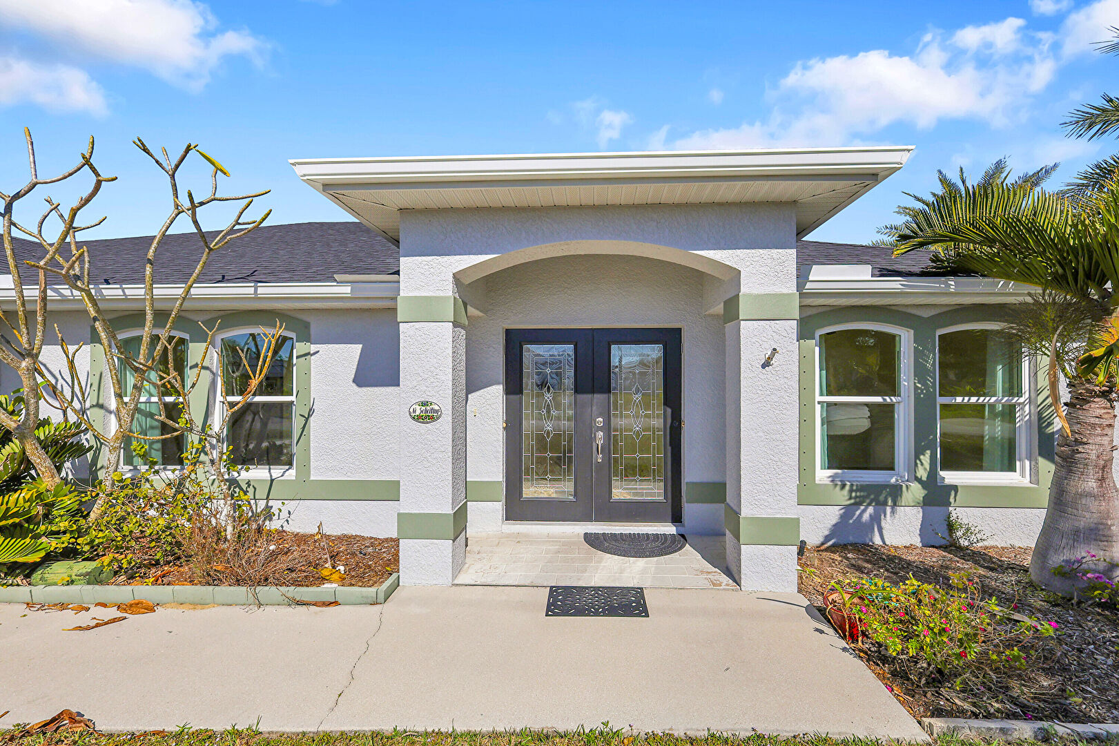 Exterior Entry at 2707 Northwest 6th Street, Cape Coral, FL 33993, listed by Que Raphael, MLS ID: 2025025524
