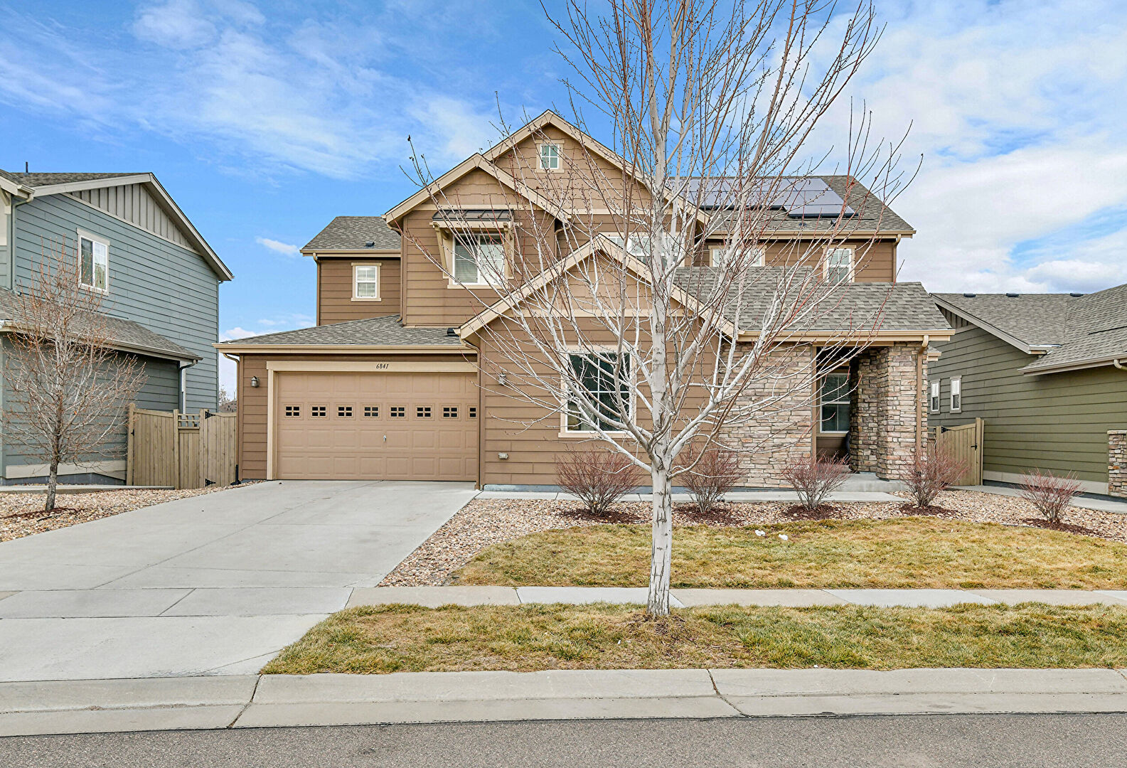 Front at 6841 West Asbury Place, Lakewood, CO 80227, listed by Russ Porter