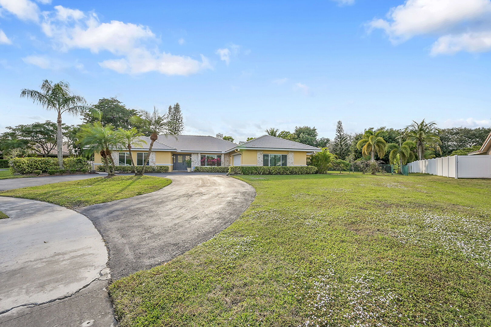 Front yard at 22299 Solitude Drive, Boca Raton, FL 33428, listed by Elena  Sultanova