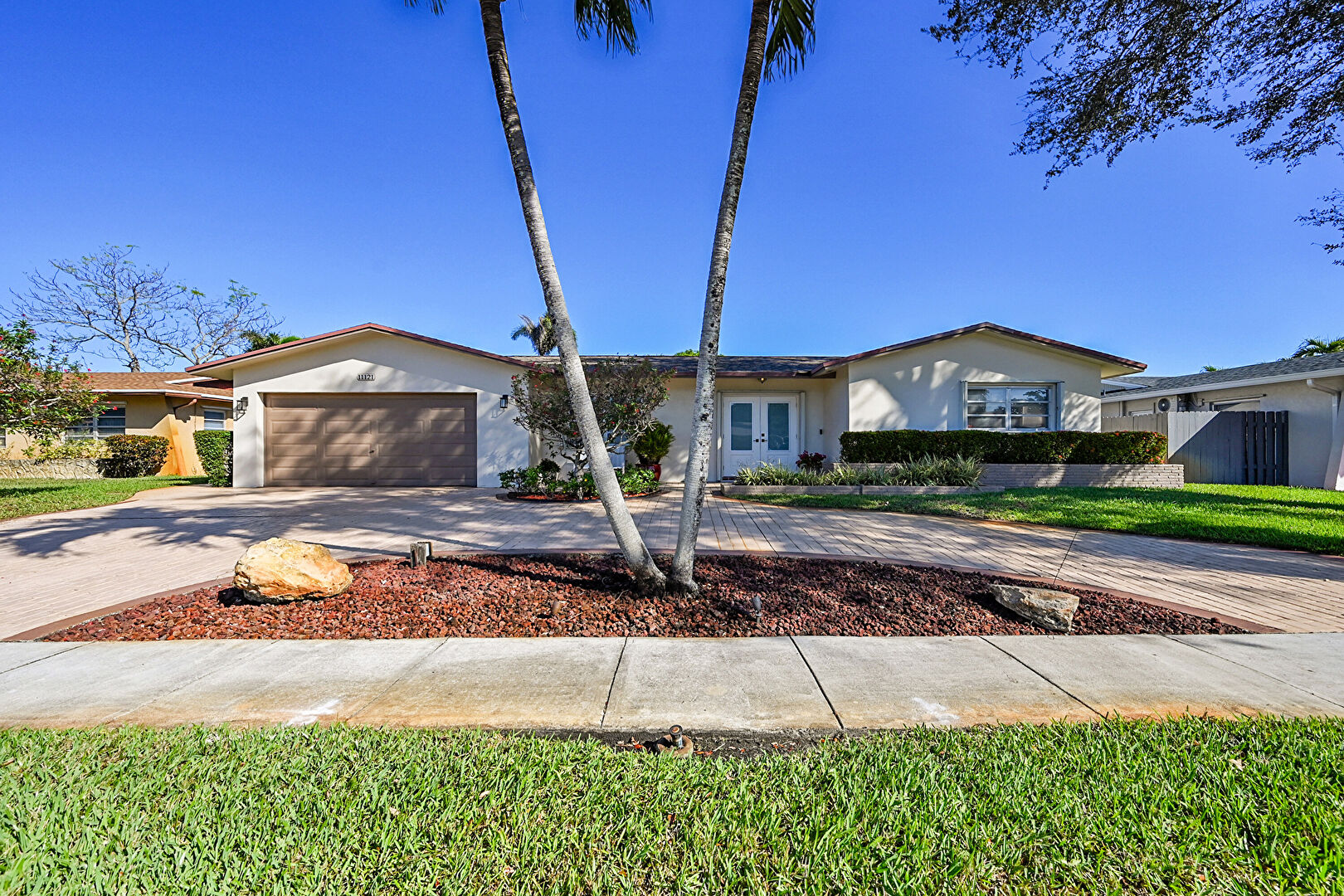 Front at 11121 Northwest 19th Street, Pembroke Pines, FL 33026, listed by Michael Clemente