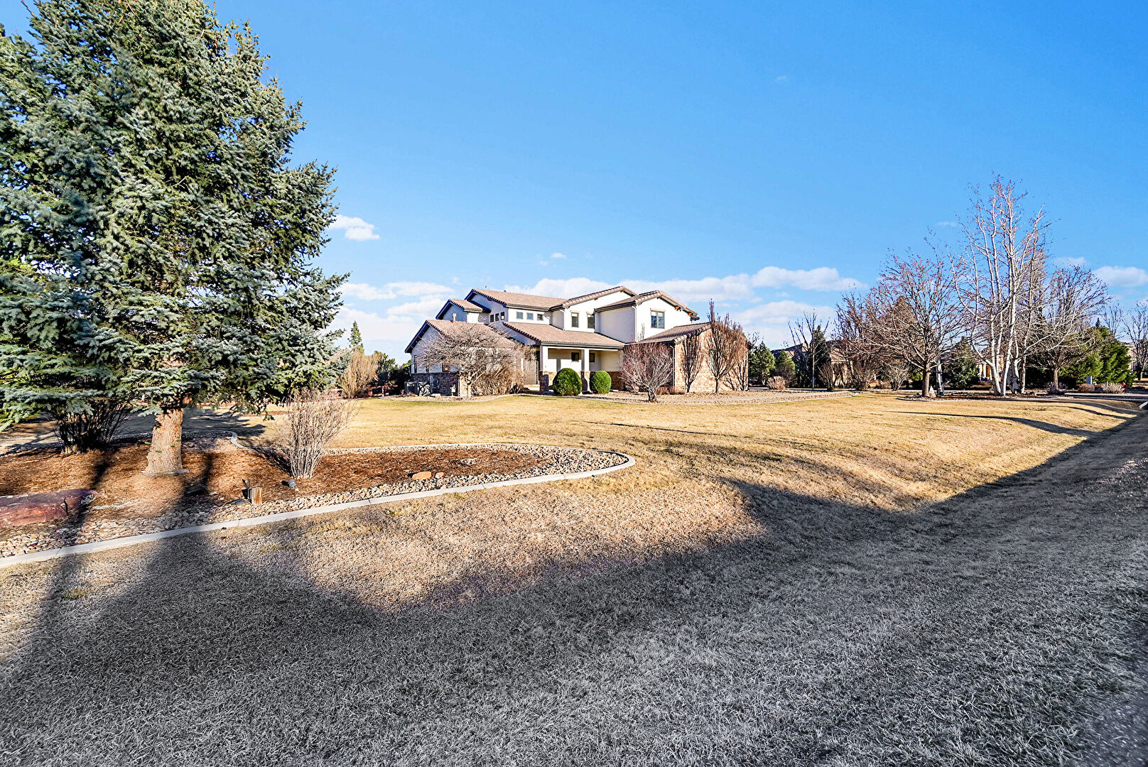 Front at 8712 Portico Lane, Longmont, CO 80503, listed by The Bernardi Group
