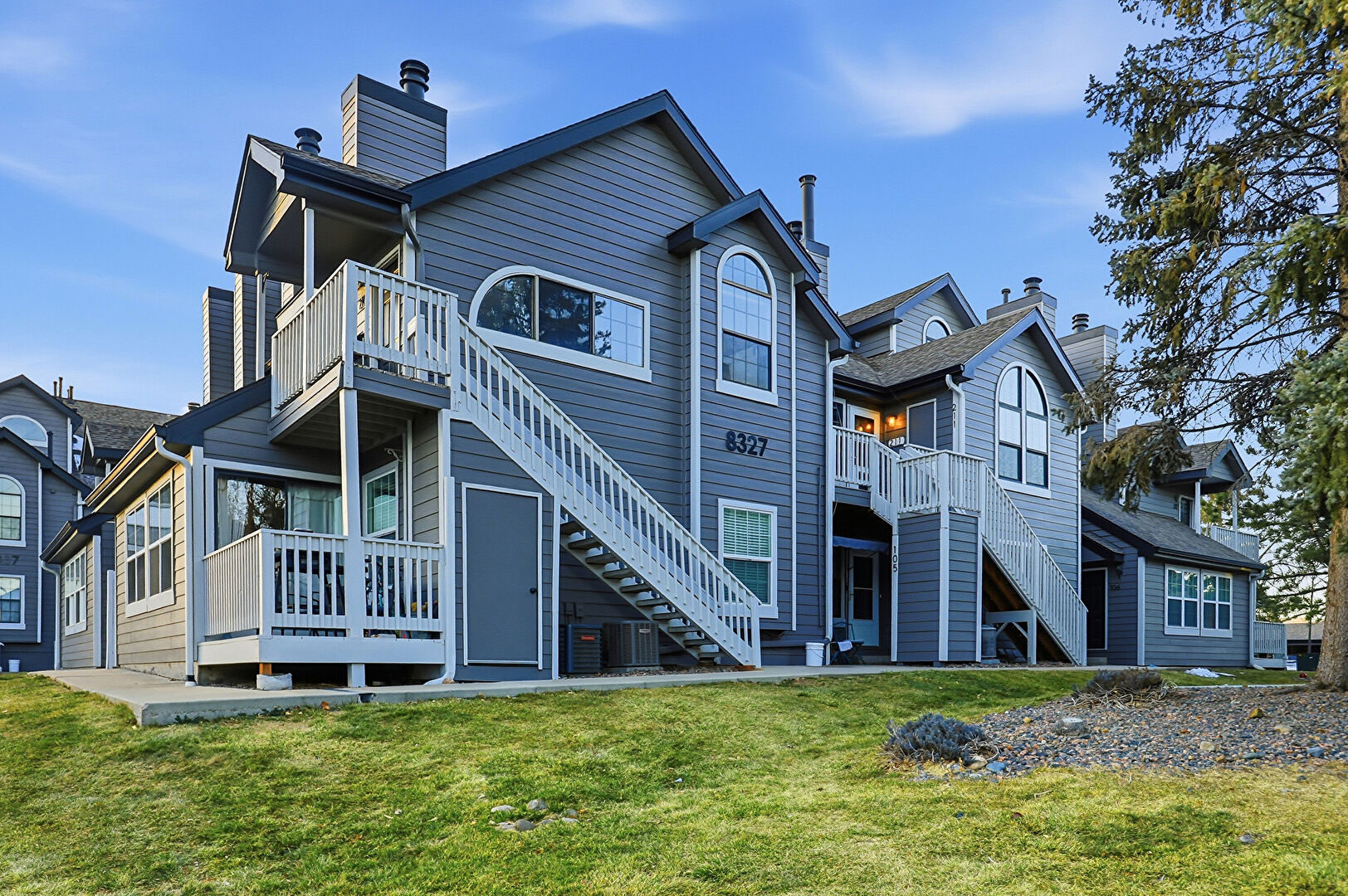 Front at 8327 South Upham Way, #3-211, Littleton, CO 80128, listed by Diane Florschuetz