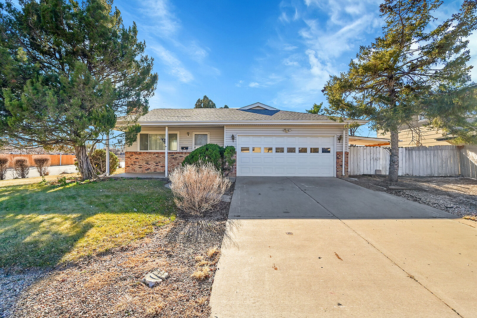 Front at 3314 West 27th Street Lane, Greeley, CO 80634, listed by Brianna Griffin