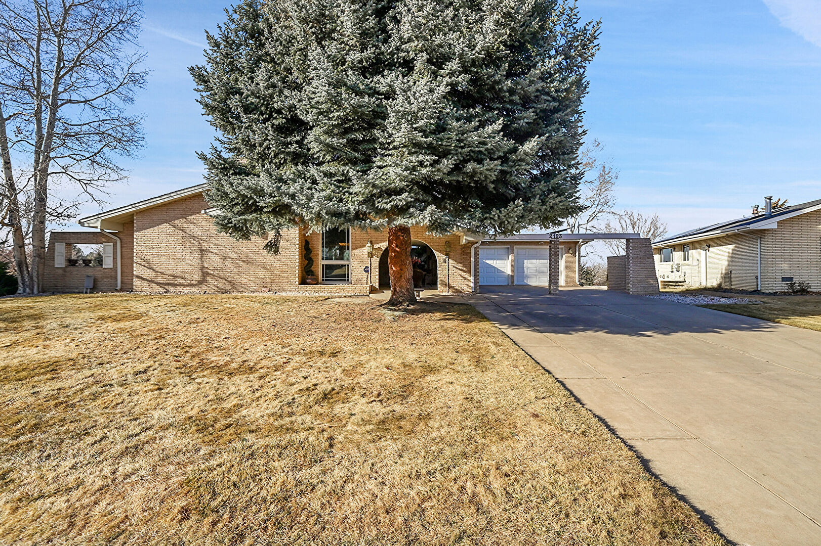 Front at 2123 Clubhouse Drive, Greeley, CO 80634, listed by Ryan Andre